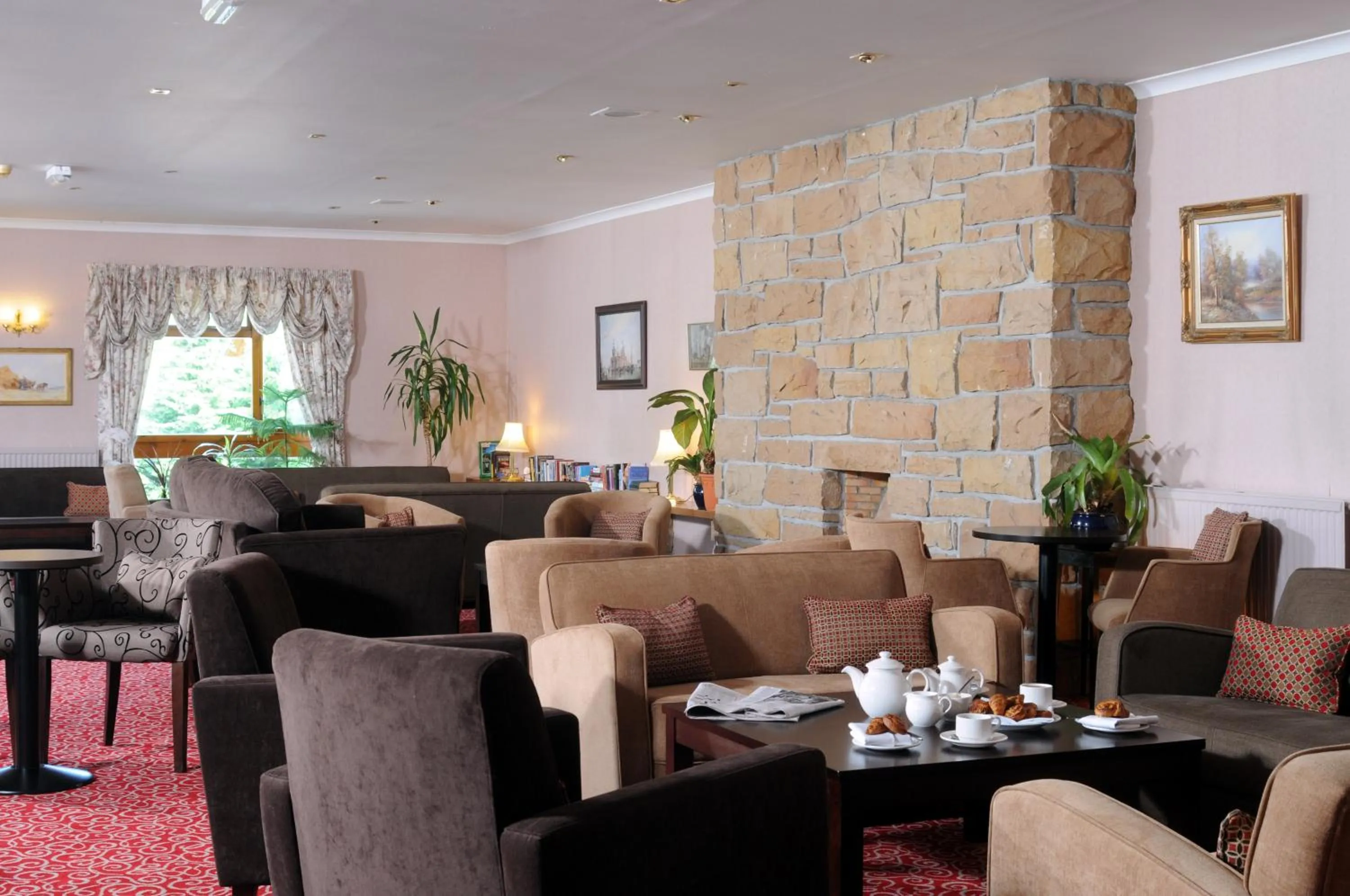 Communal lounge/ TV room in Highlander Hotel ‘A Bespoke Hotel’