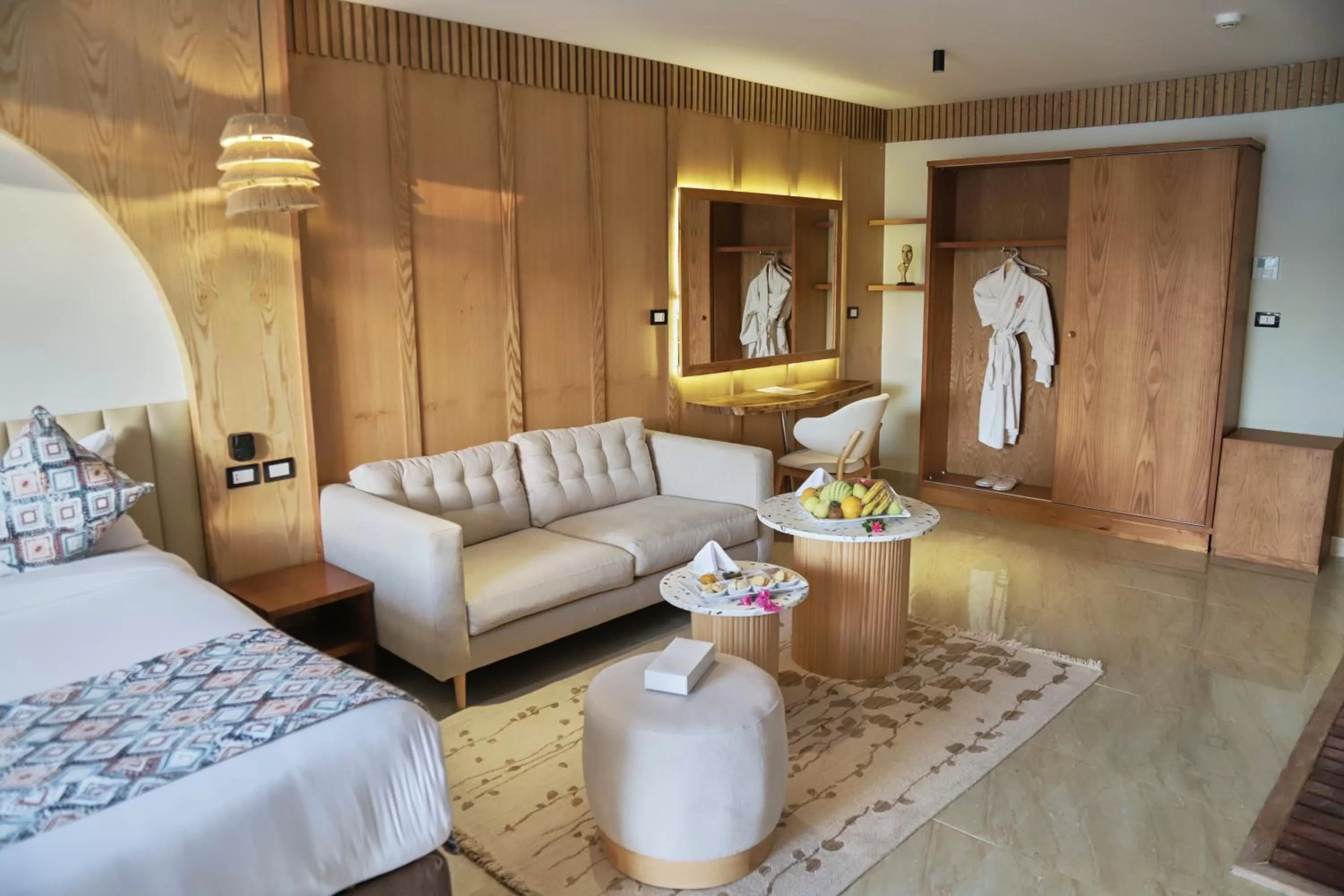 Seating area, Bed in Panorama Bungalows Resort El Gouna