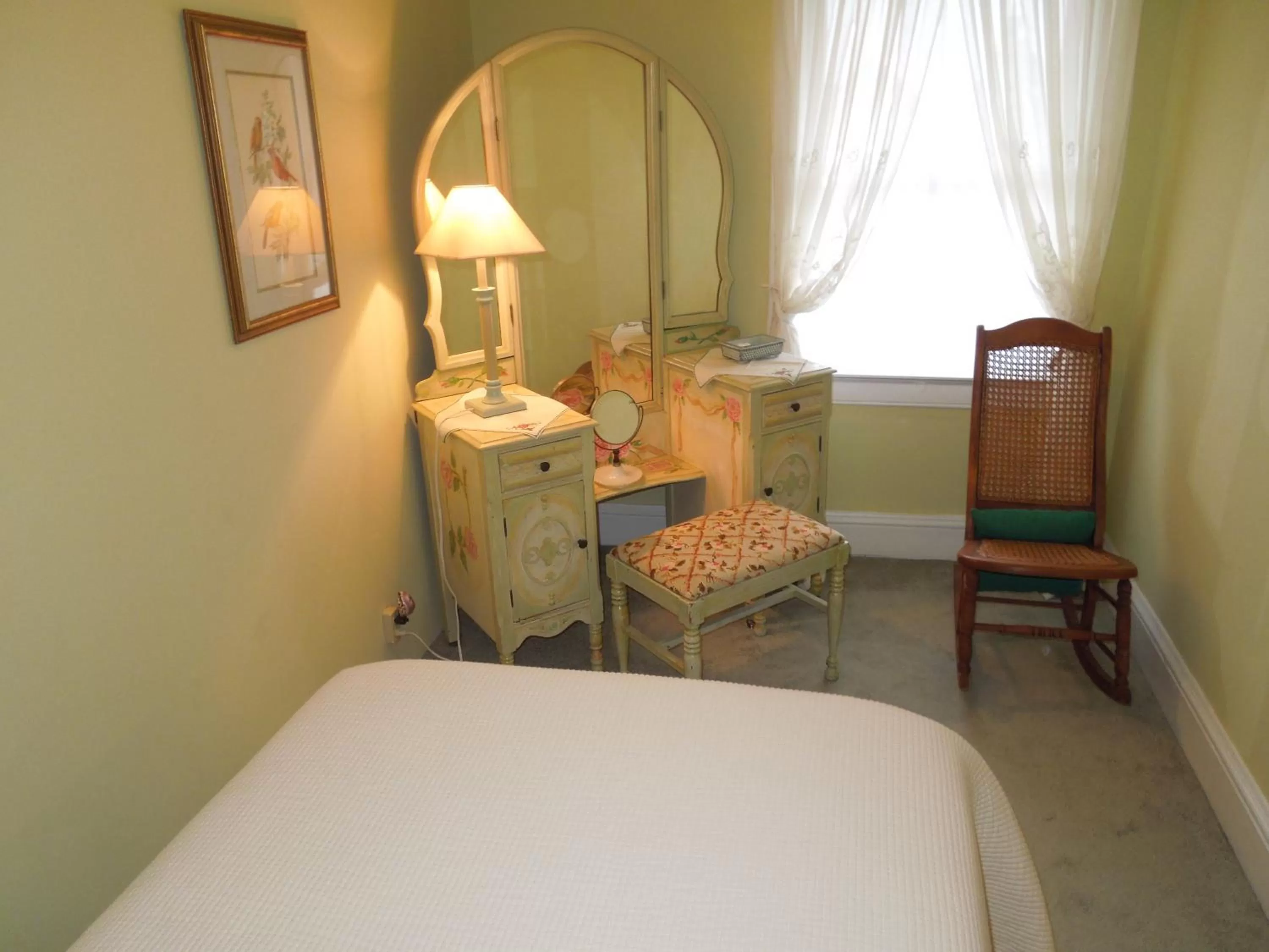 Decorative detail, Bed in Victorian Bed & Breakfast of Staten Island