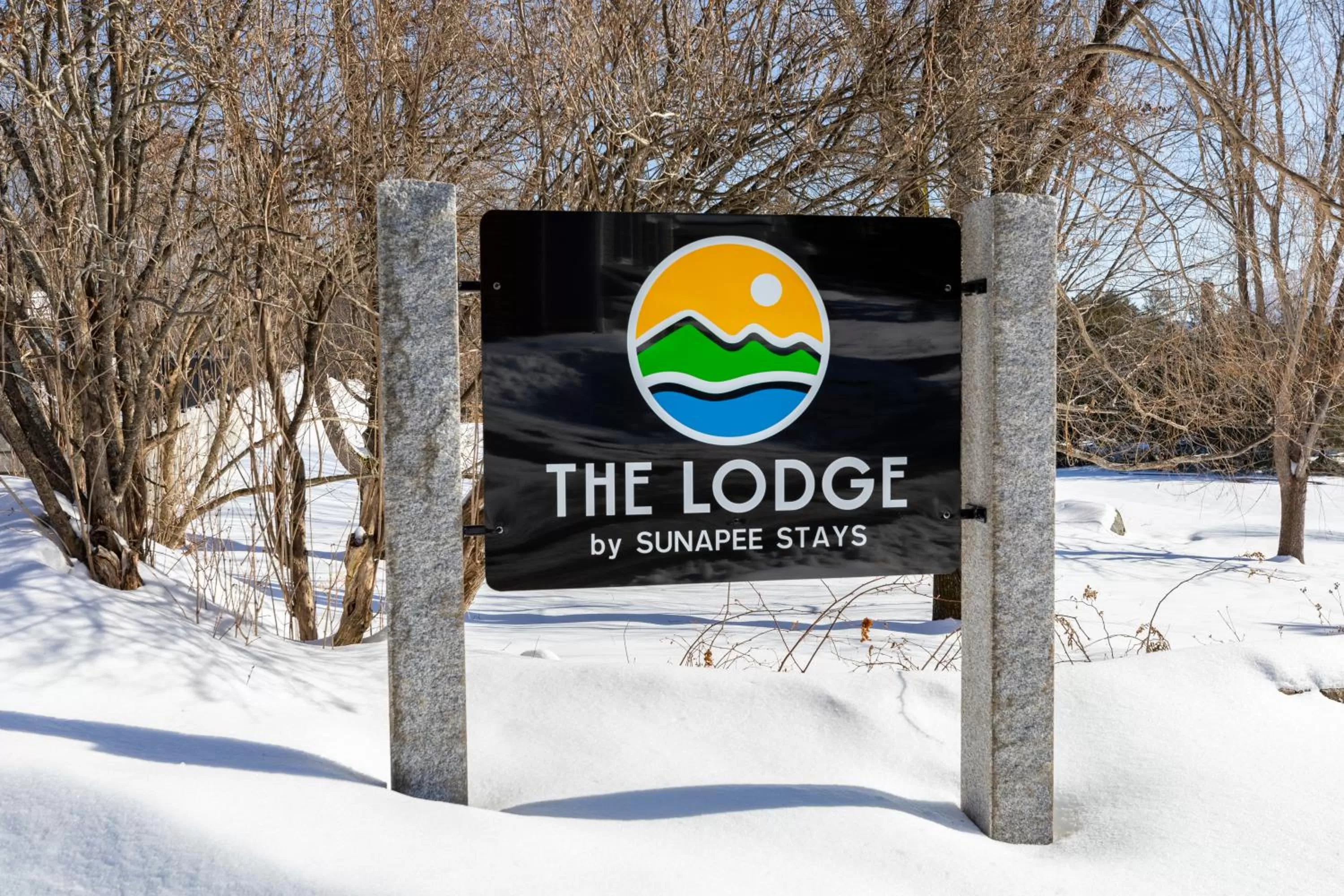 Property logo or sign in The Lodge by Sunapee Stays