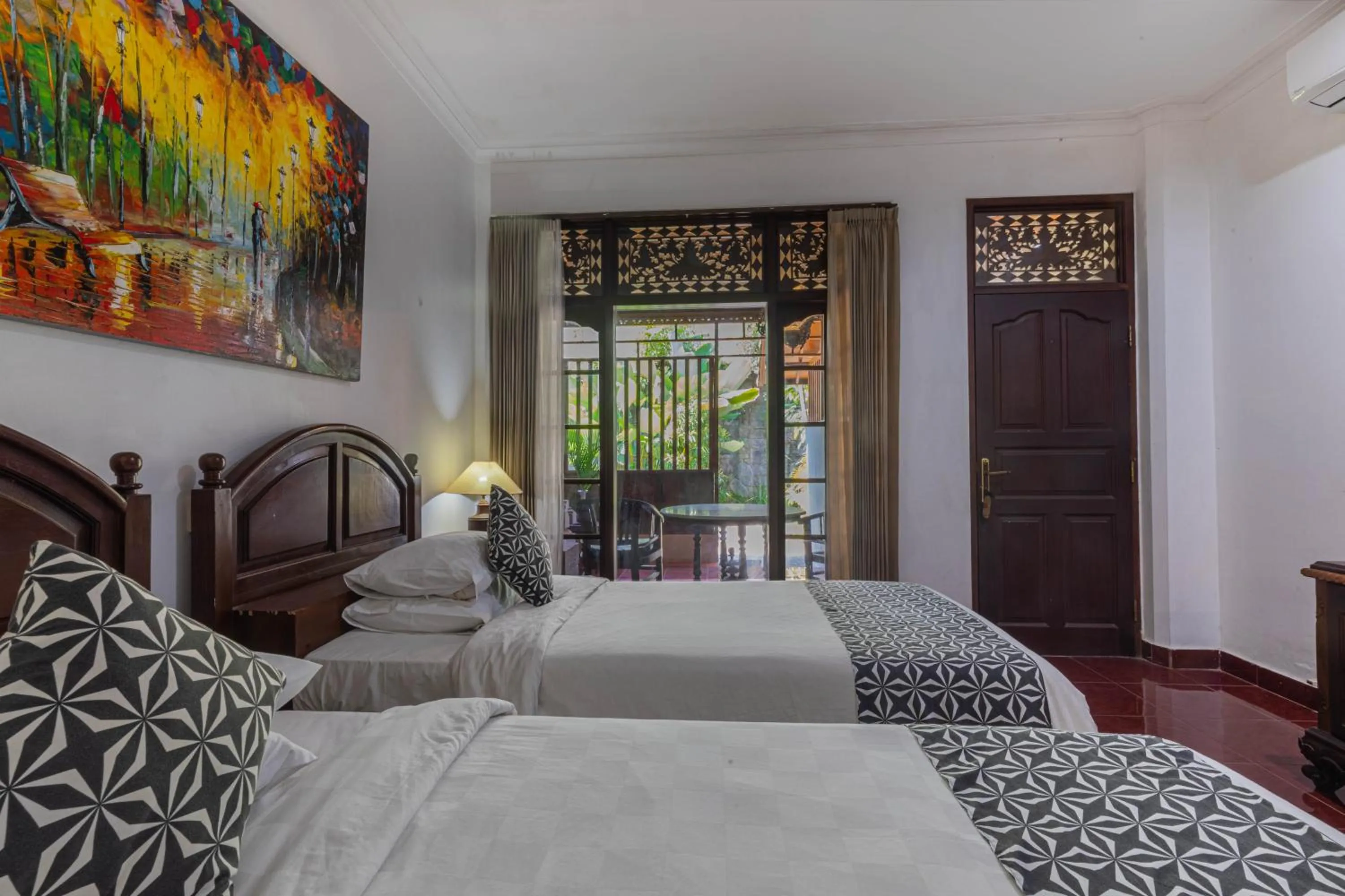 Photo of the whole room in Puri Mango Guest House Sanur