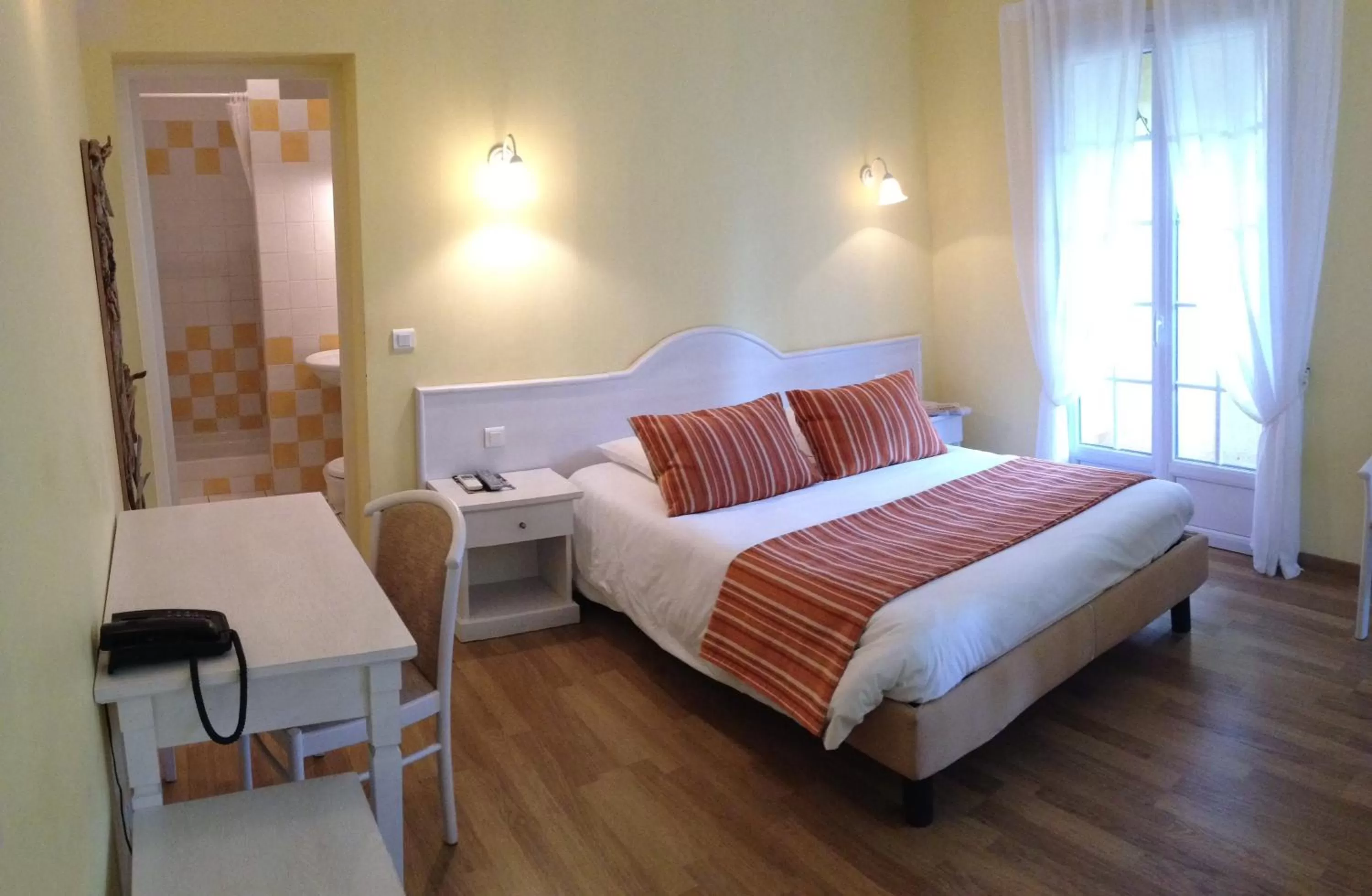 Bed in Auberge les Oliviers