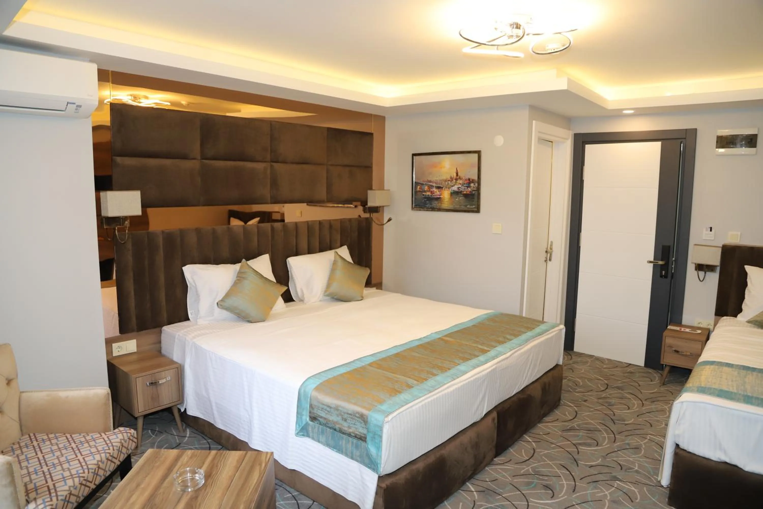 Photo of the whole room, Bed in Grand Kavi Hotel