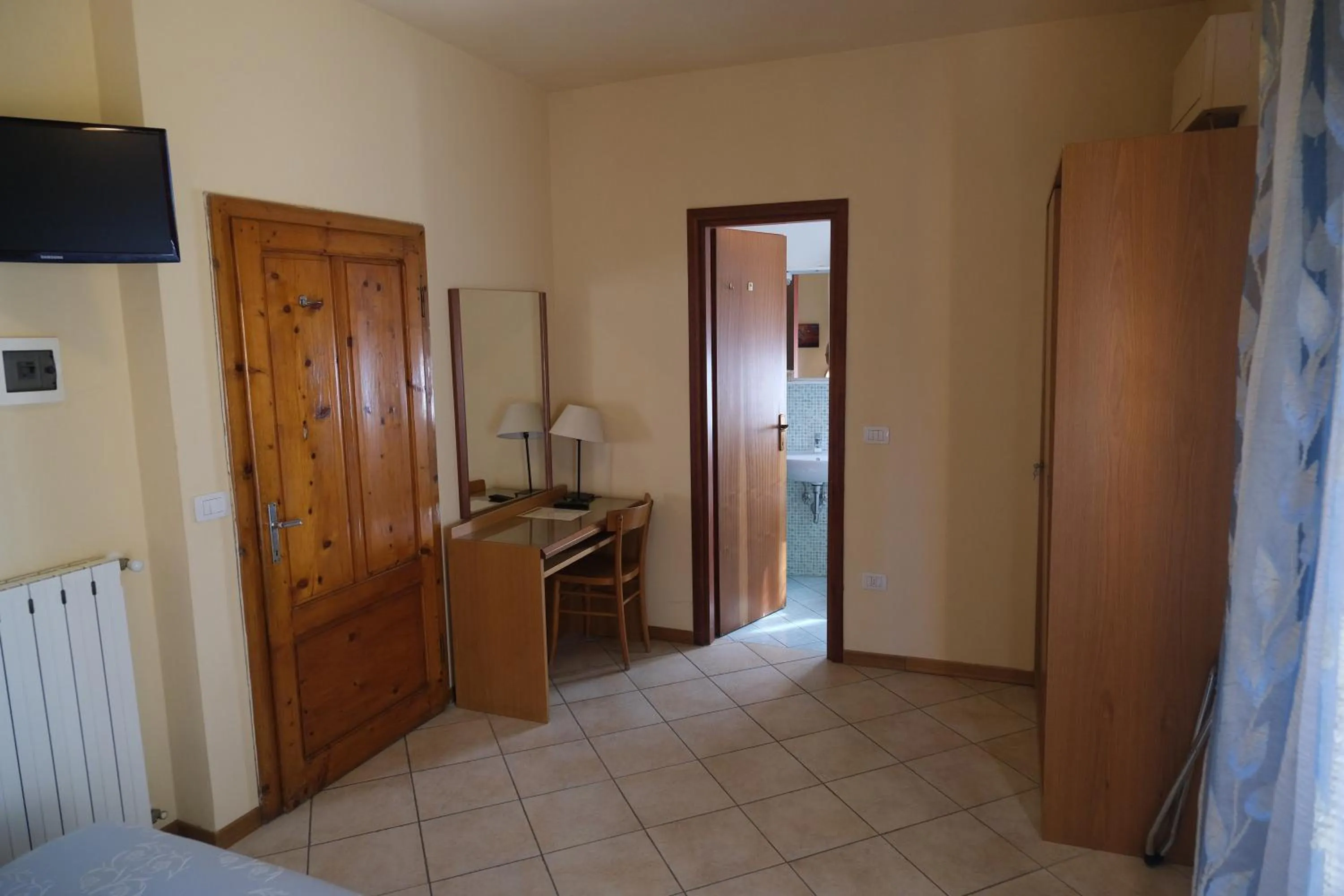 Bedroom in Amelia Hotel