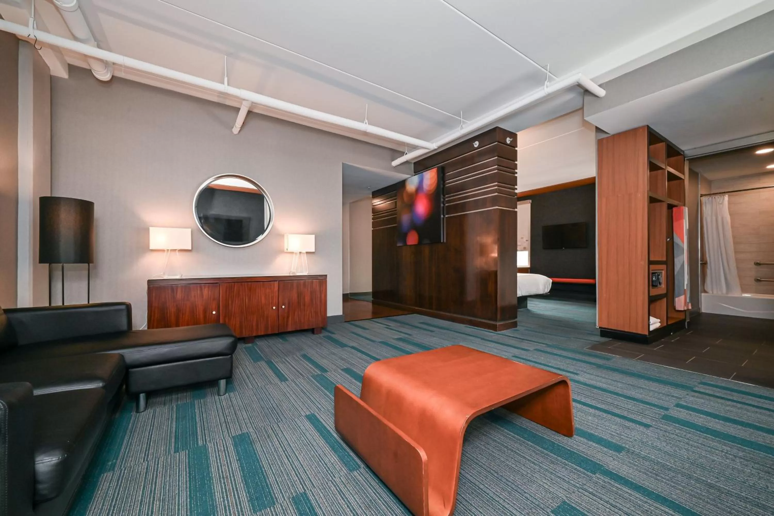 Living room, Bed in Aloft Charlotte City Center