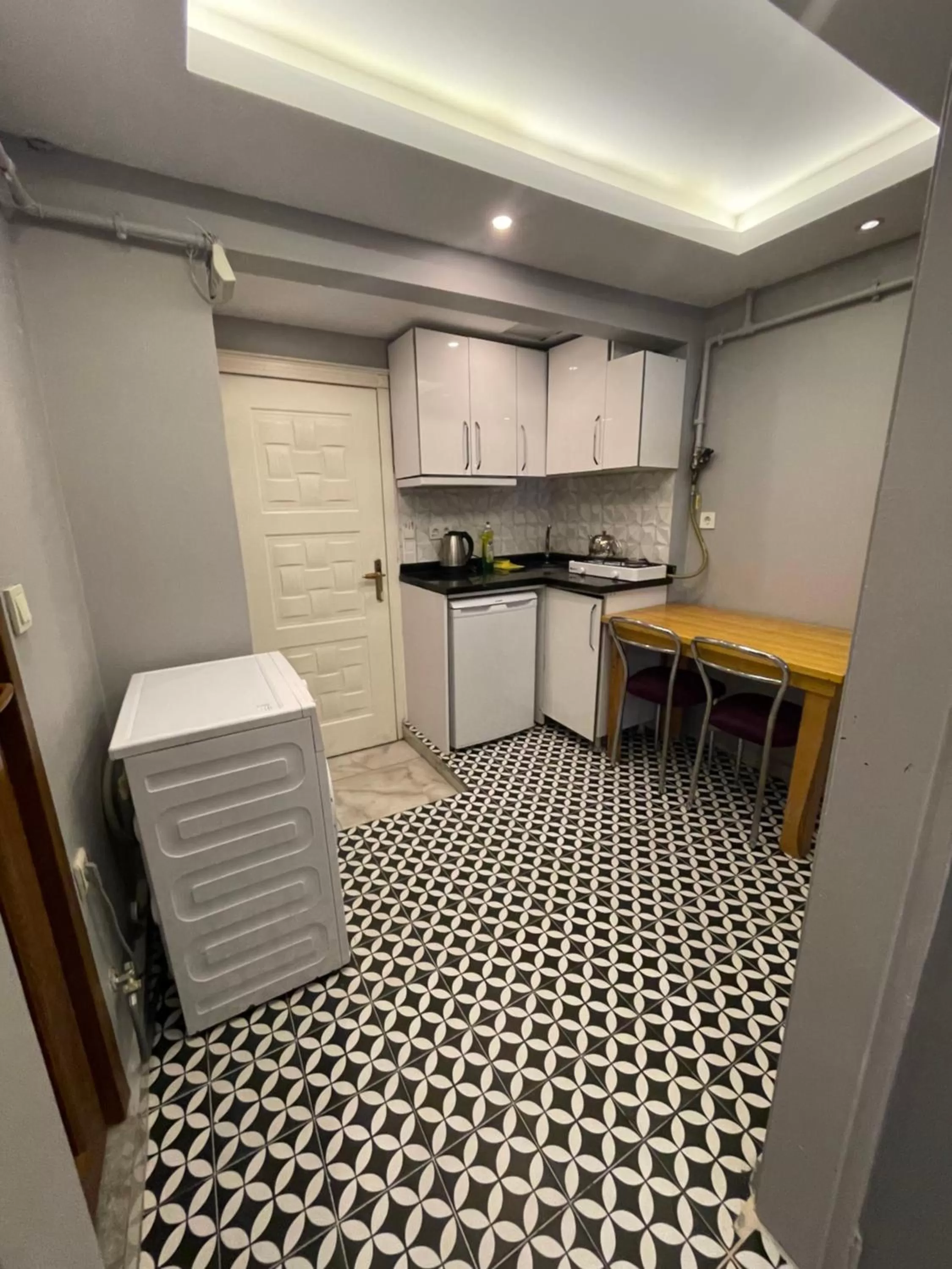 Kitchen or kitchenette in Arat Apartments