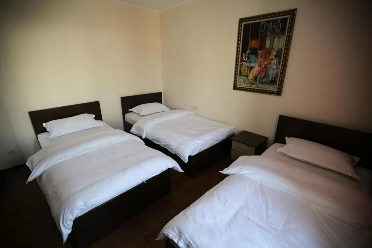 Bed in Altai Business Hotel