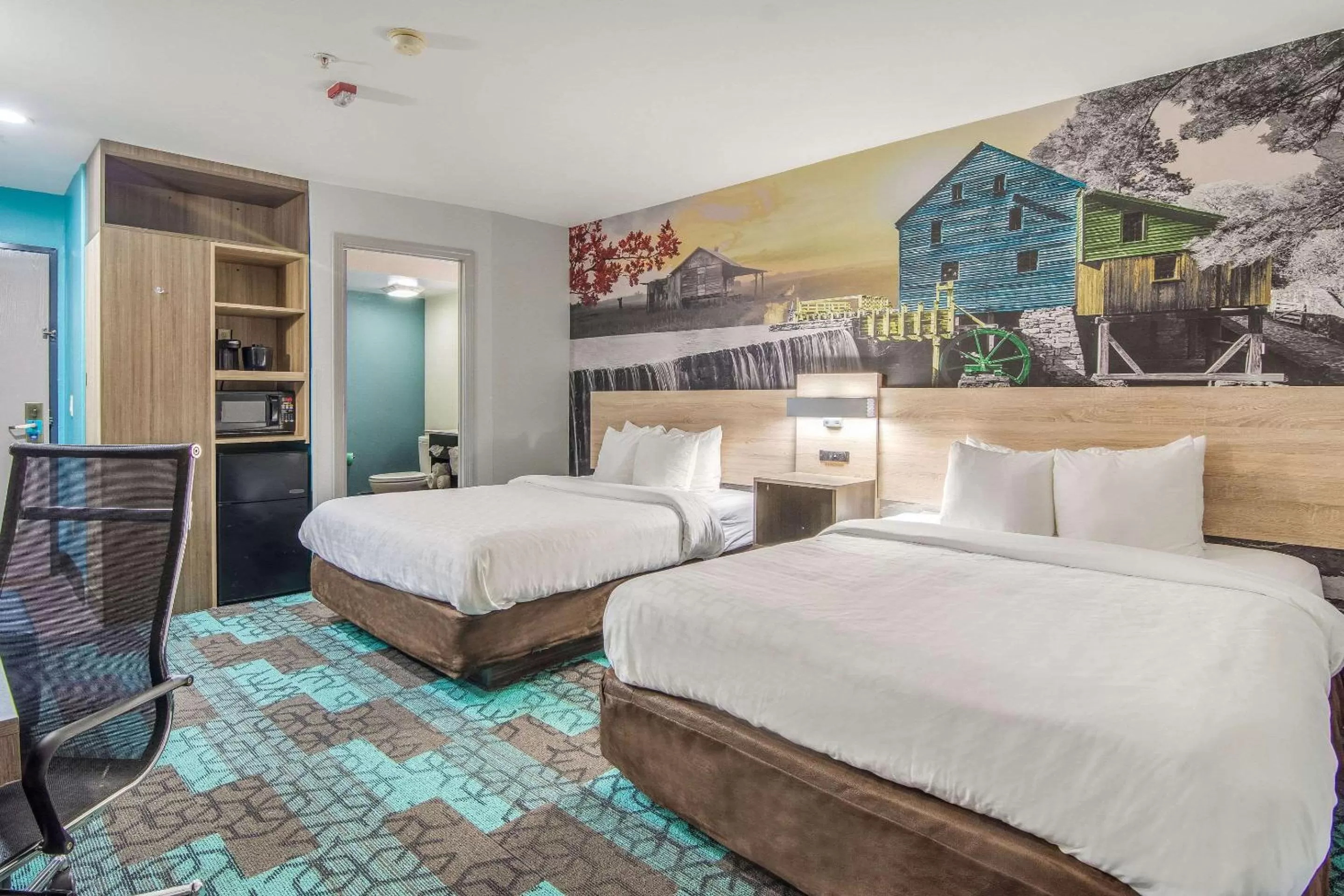 Photo of the whole room, Bed in Clarion Pointe Wake Forest - Raleigh North