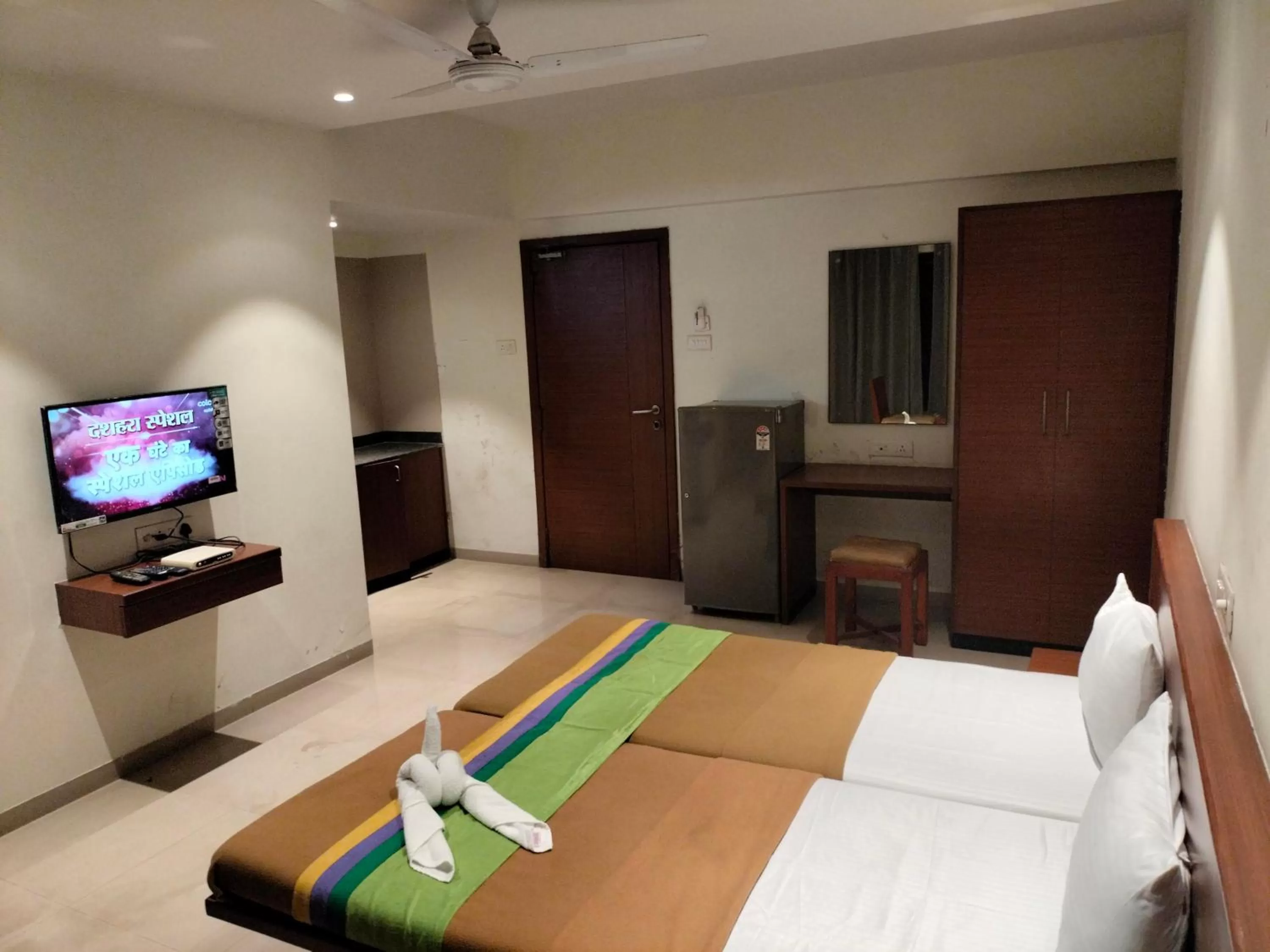 Bed in Hotel Sumanchandra Suites