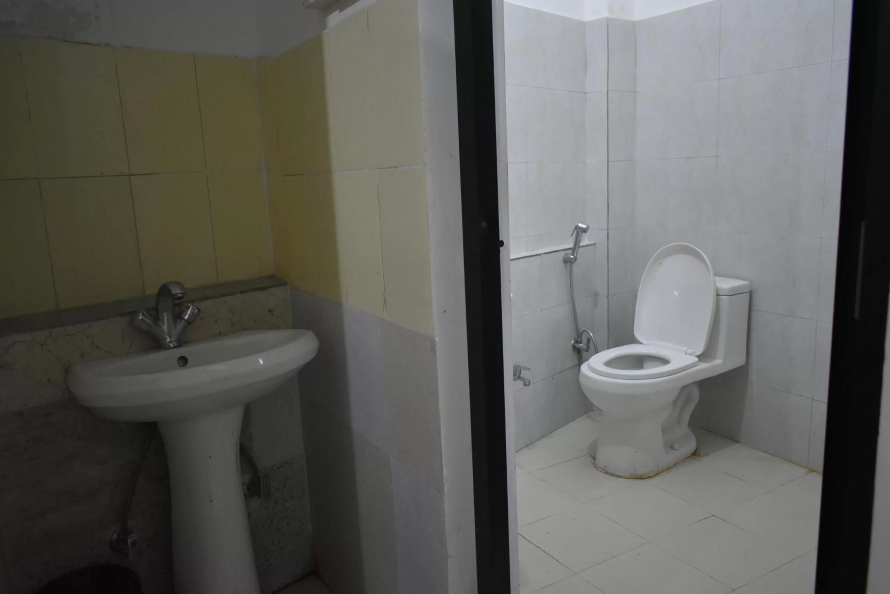 Bathroom in Tapasthali by Meera Hotels