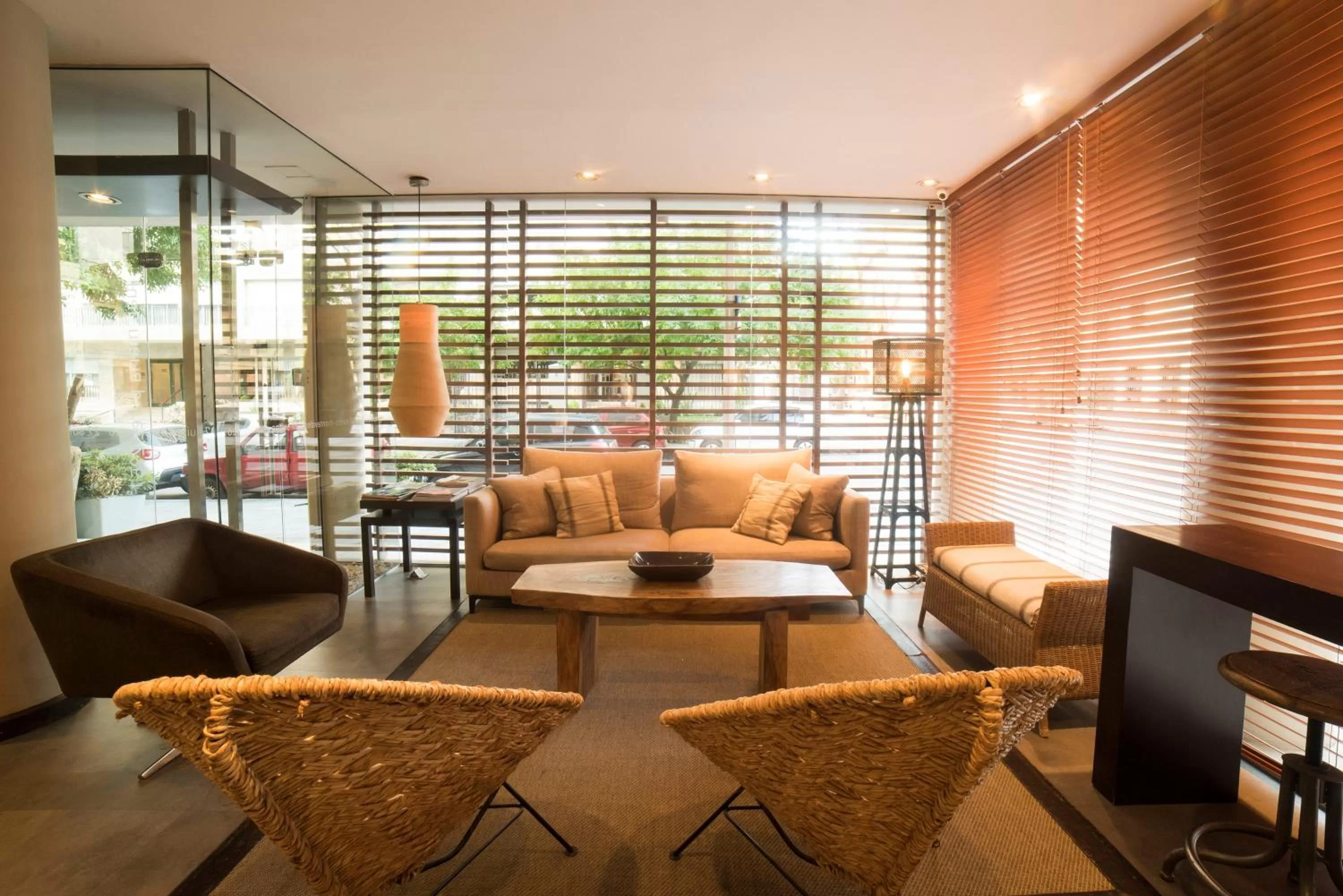 Communal lounge/ TV room in 27 Suites Hotel