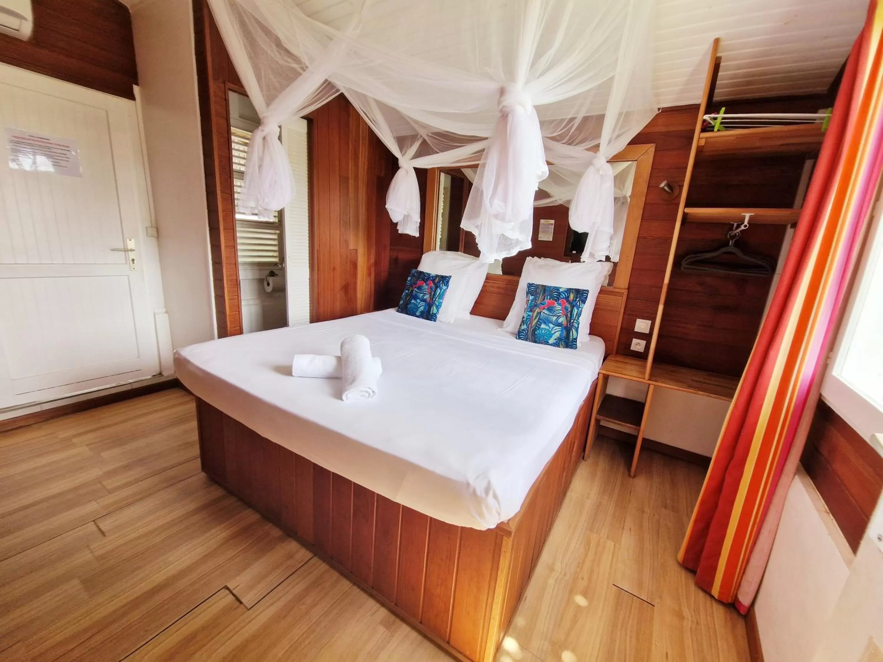 Bed in Hotel Le Manguier