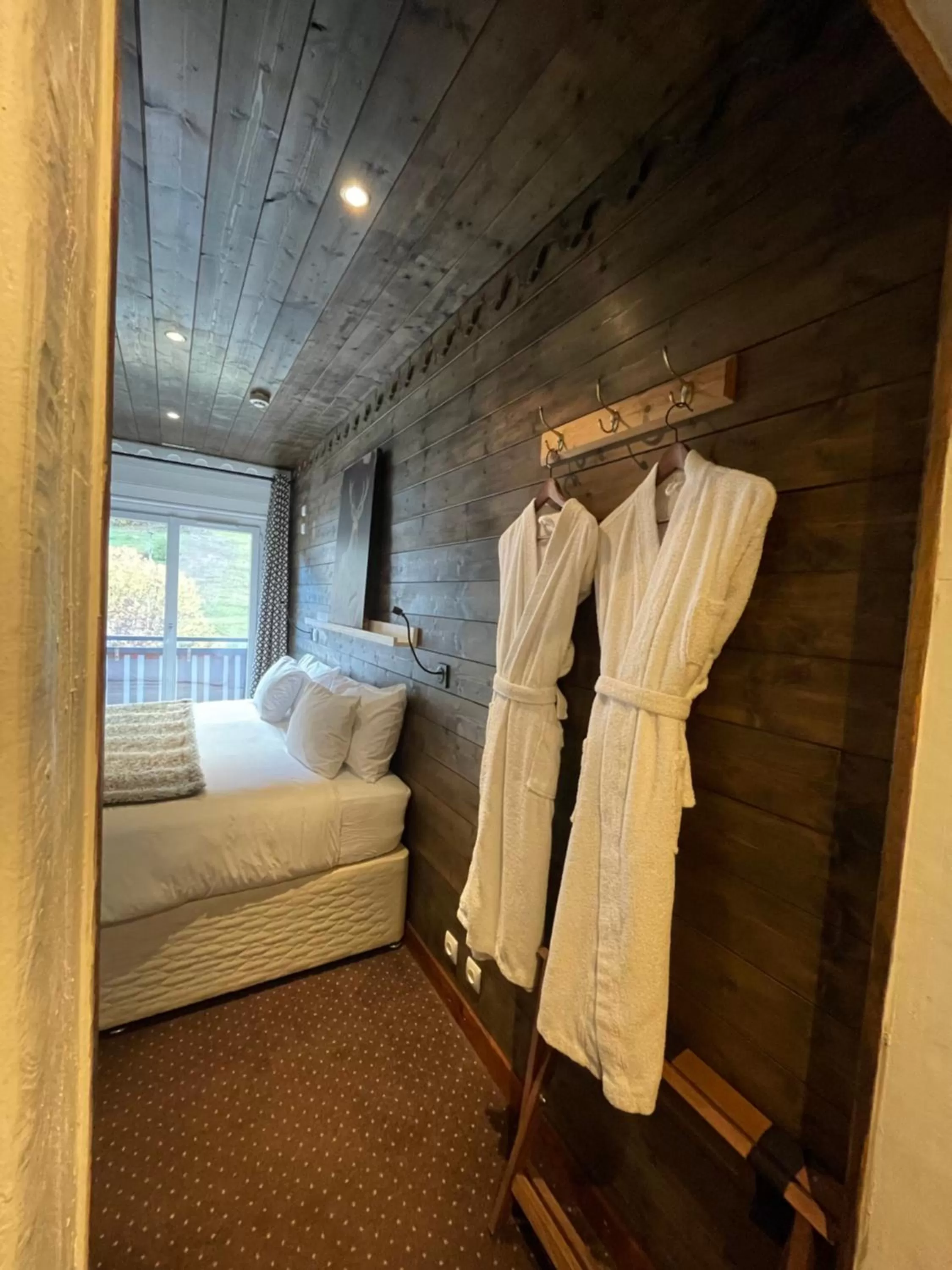 Bed in Hôtel La Chaumière