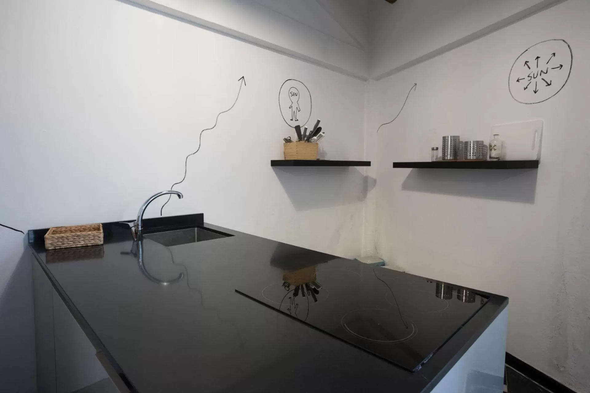 Kitchen or kitchenette in Boutique Hotel Novecento