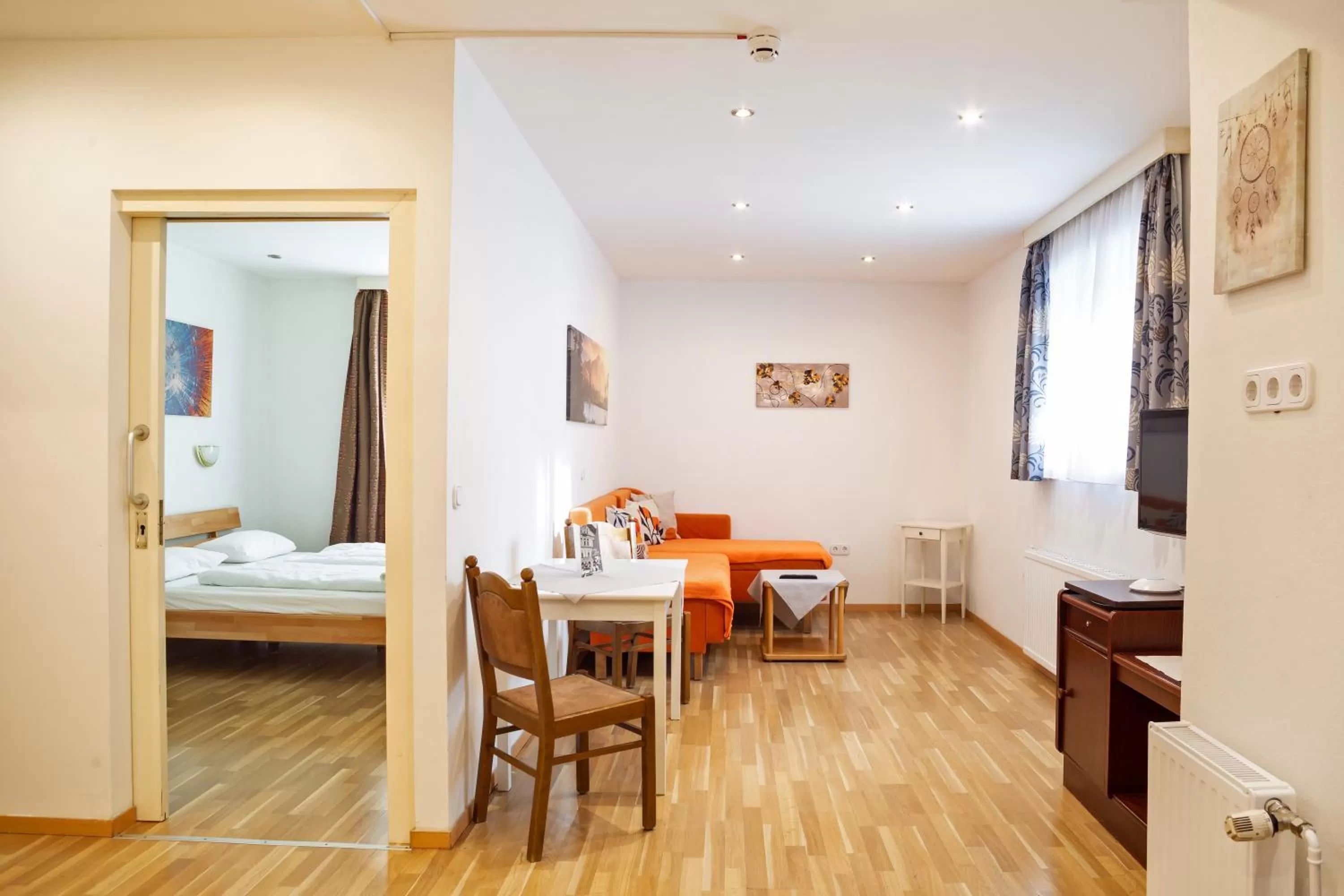 Living room, Bed in Hotel Gisela