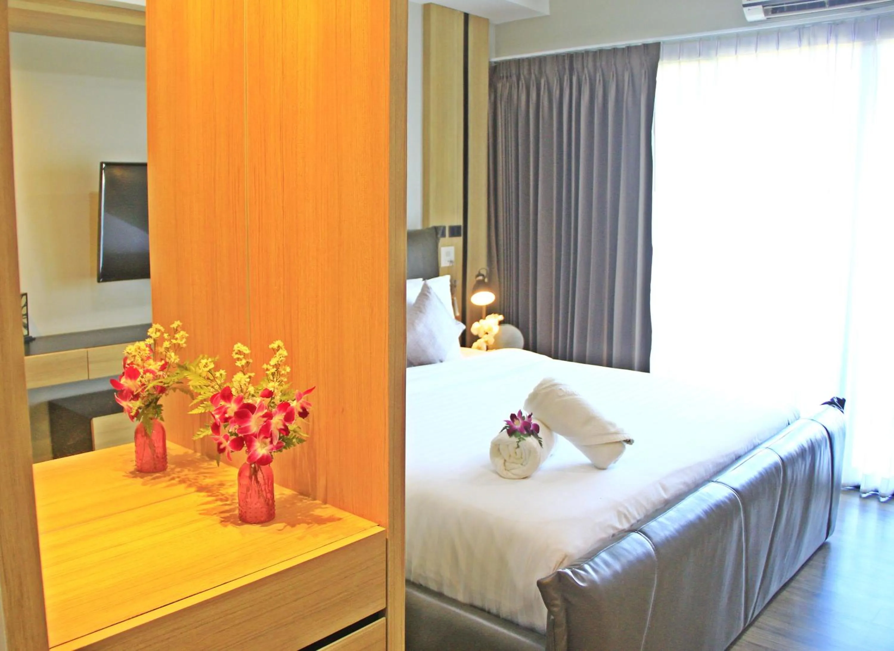 Bed in Wellness Chiang Mai Hotel