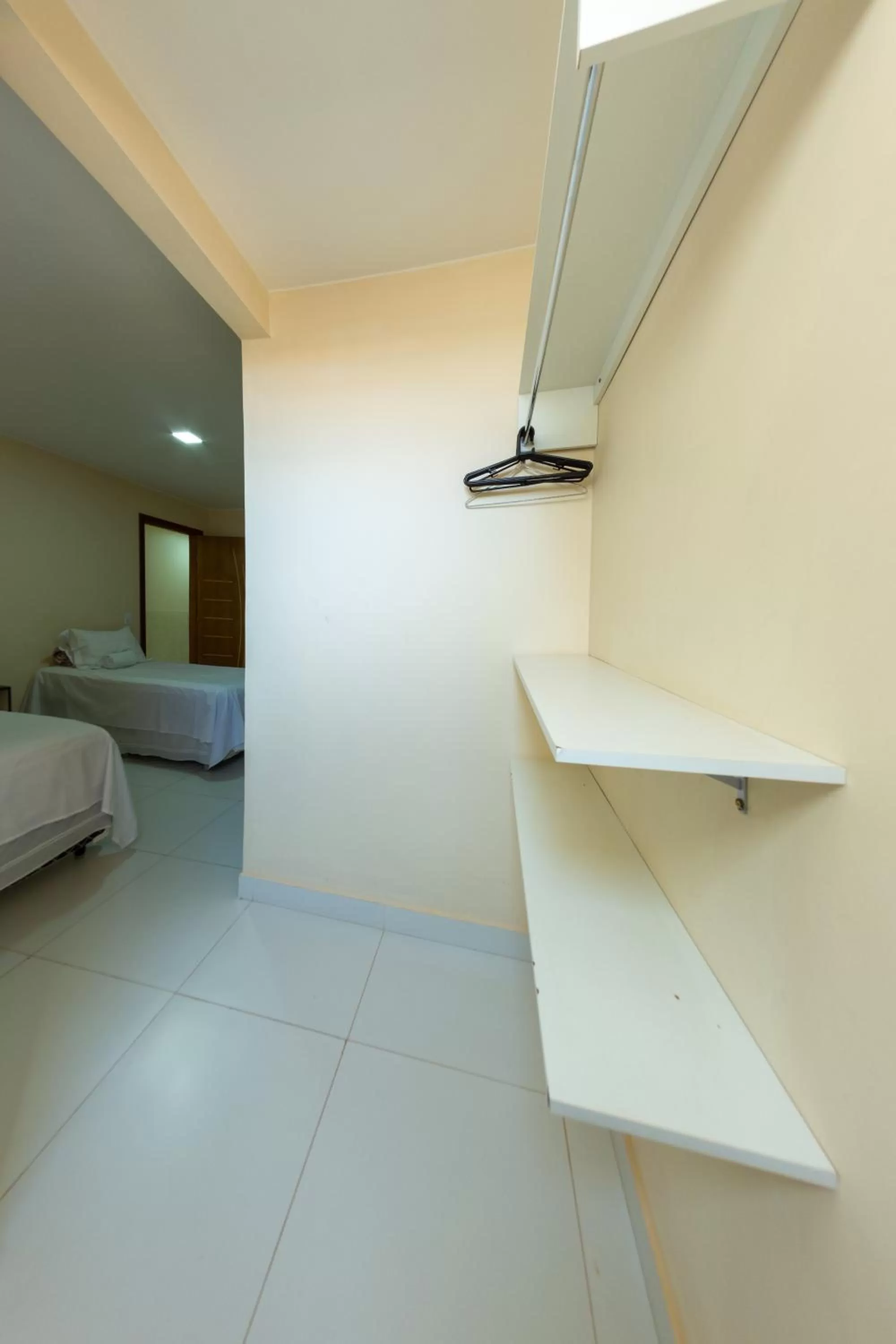 Bed in Pousada Jardim Brasília