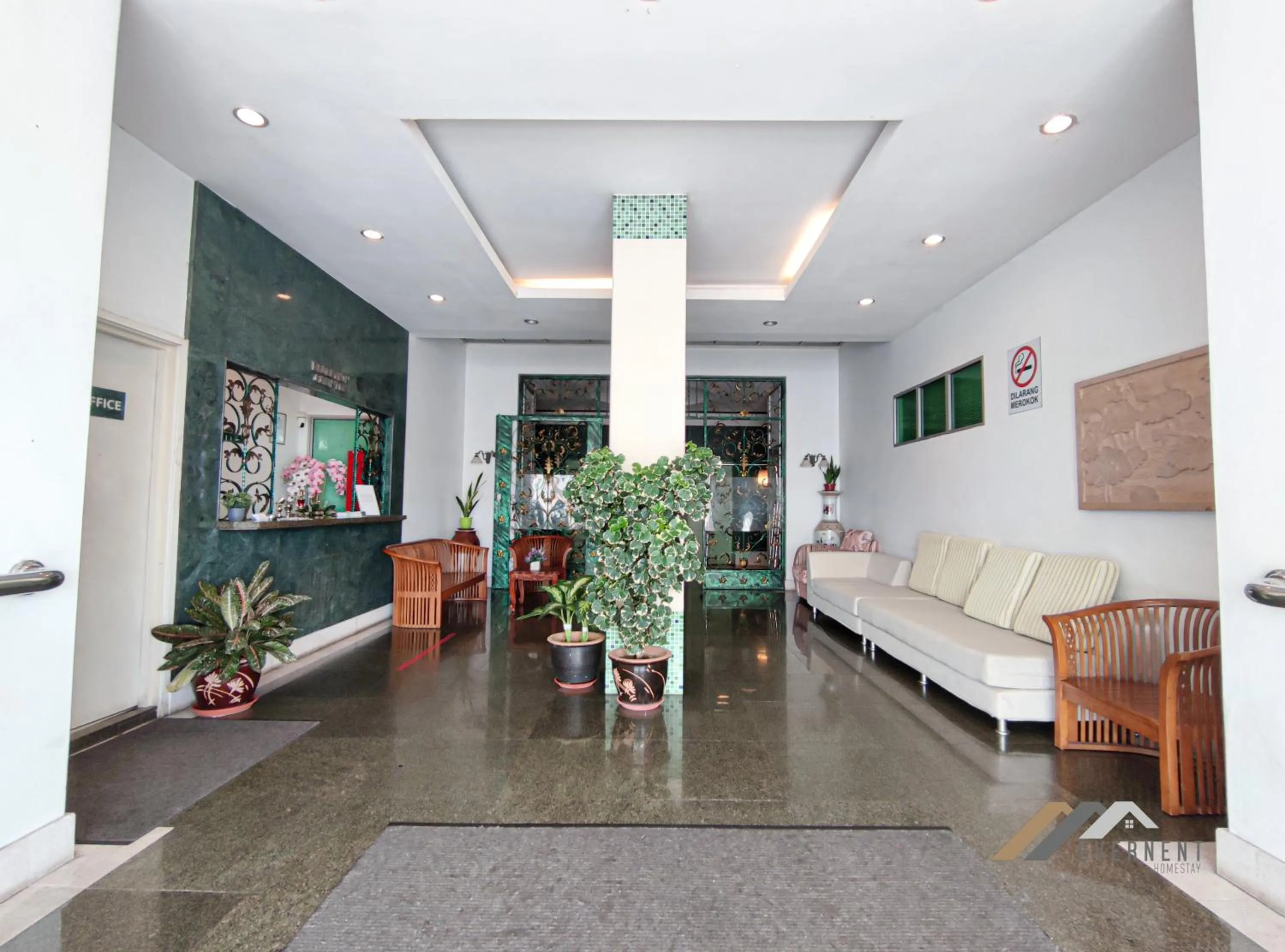 Lobby or reception in Mciti Suites by Evernent