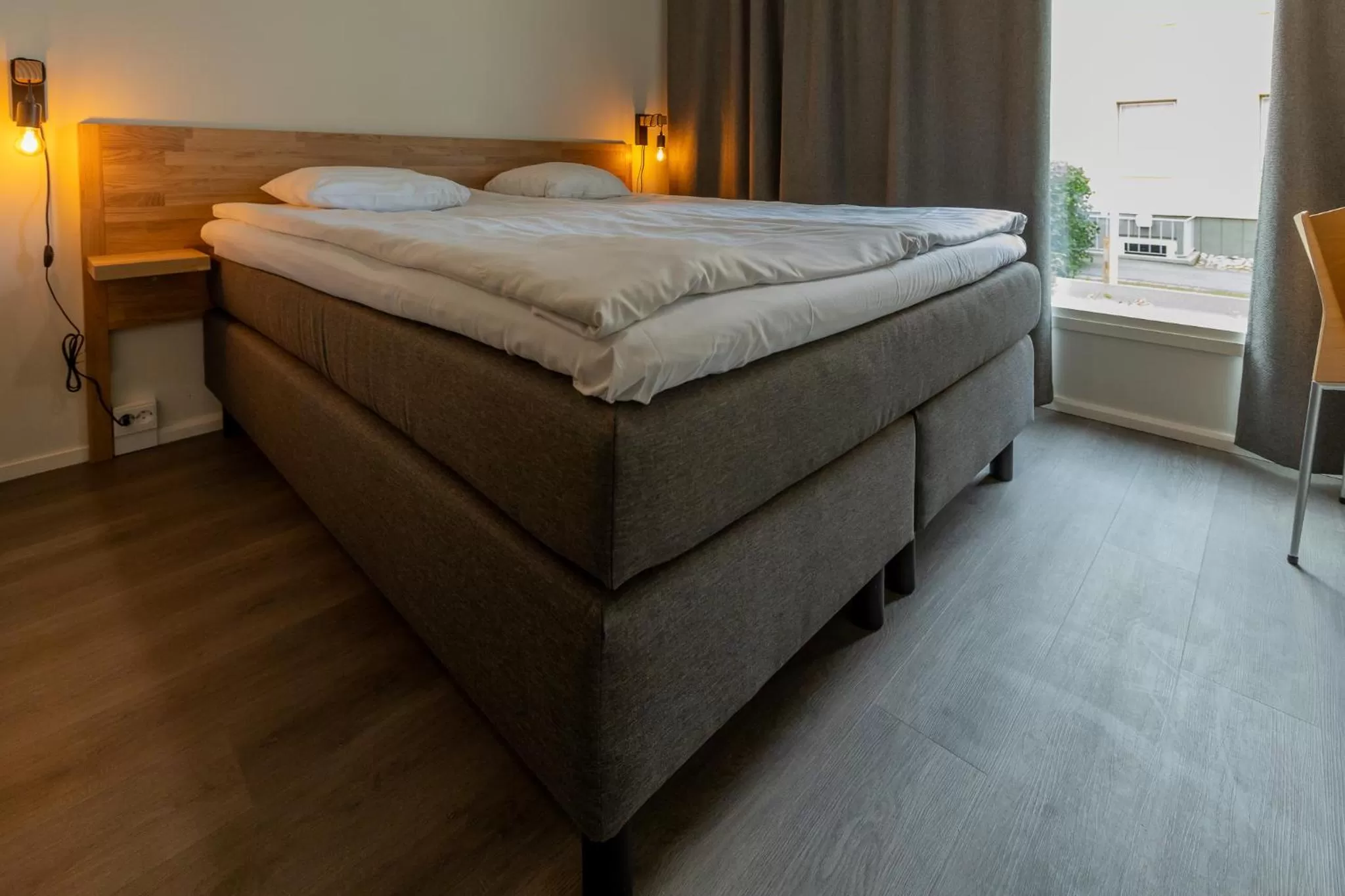 Bed in De Gamlas Hem Hotel & Restaurant