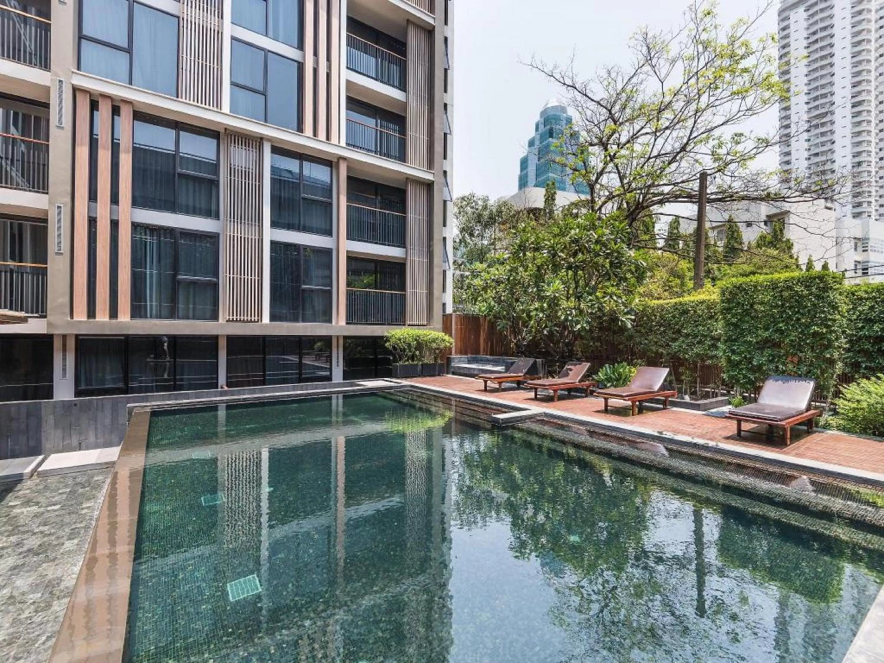 Swimming pool in Arcadia Suites Bangkok