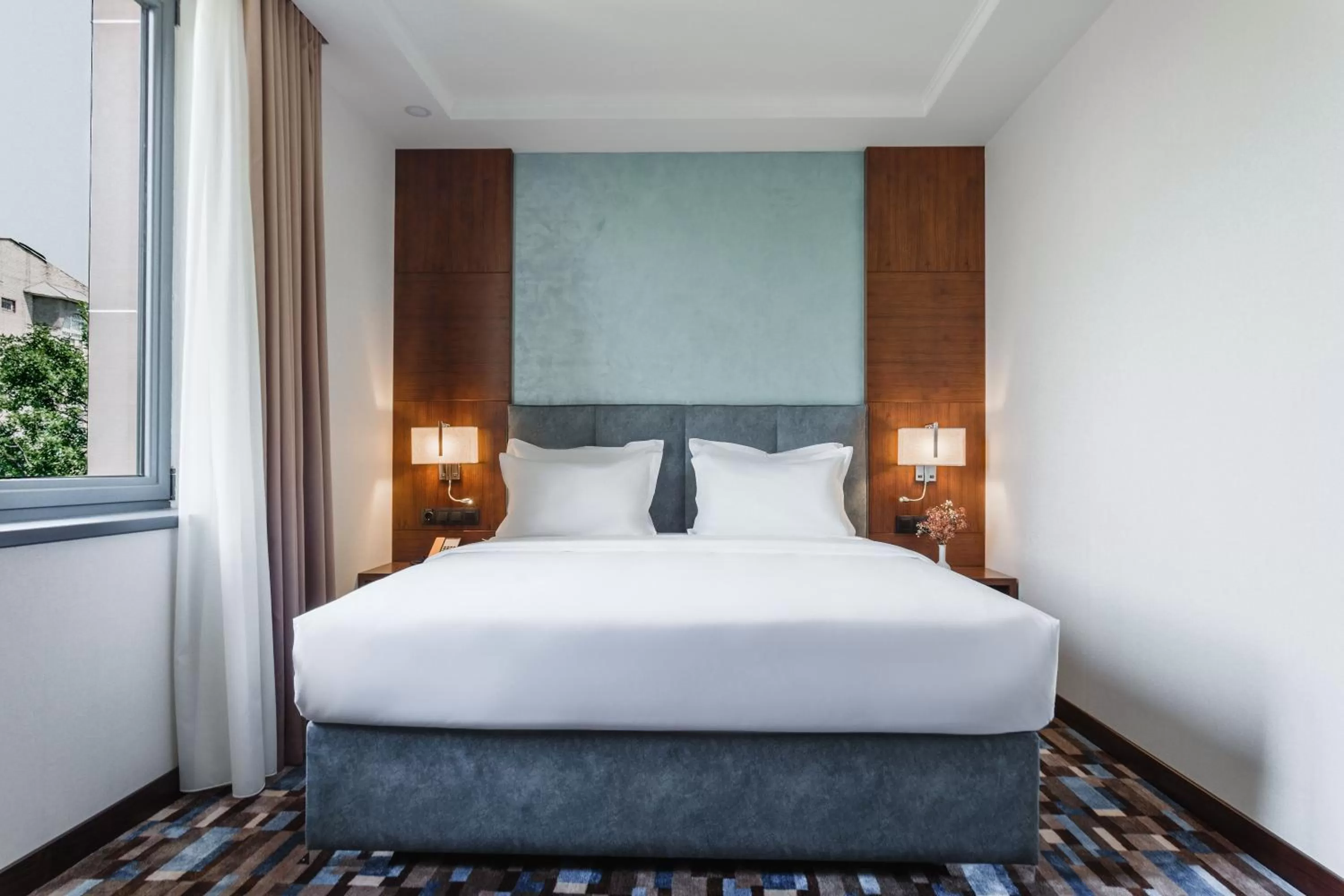 Bed in ATECA Hotel Suites Tashkent