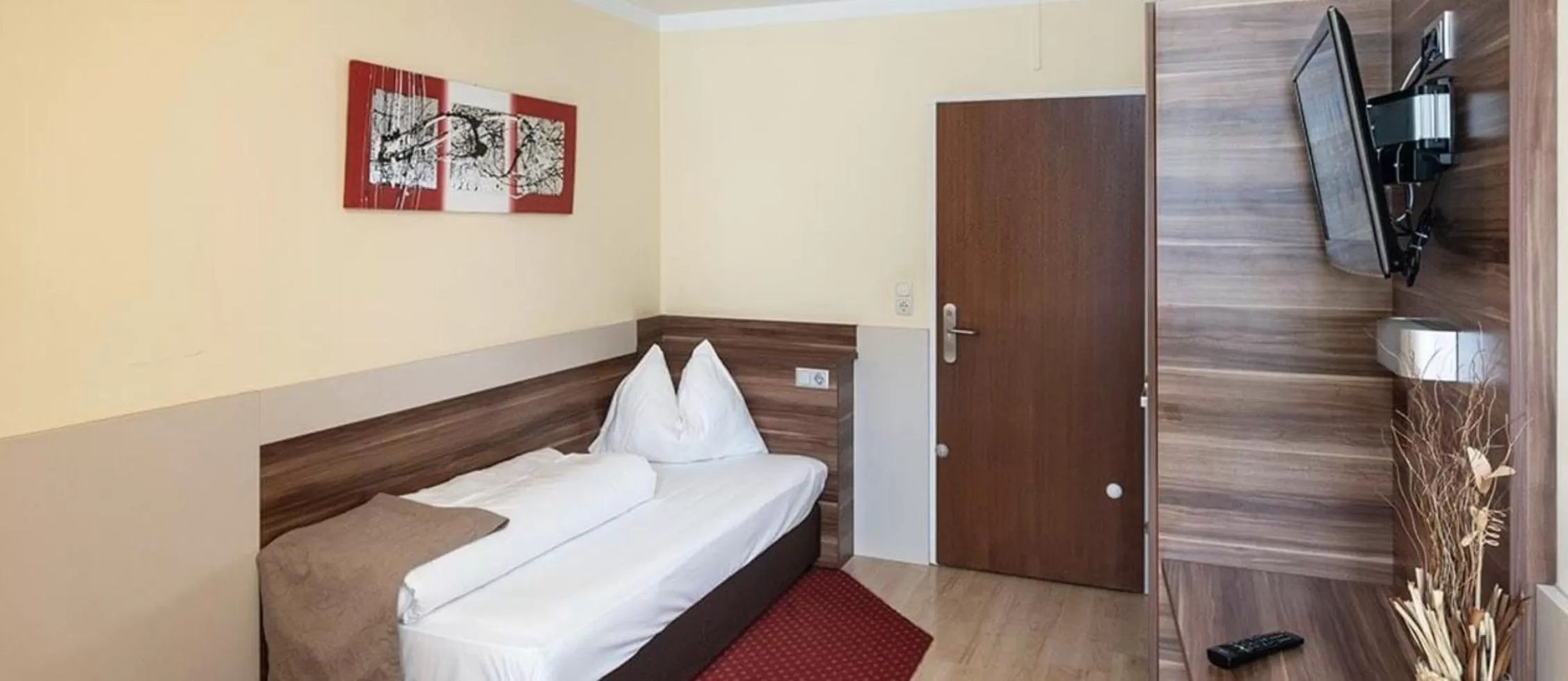 Photo of the whole room, Bed in Hotel Kufsteinerhof