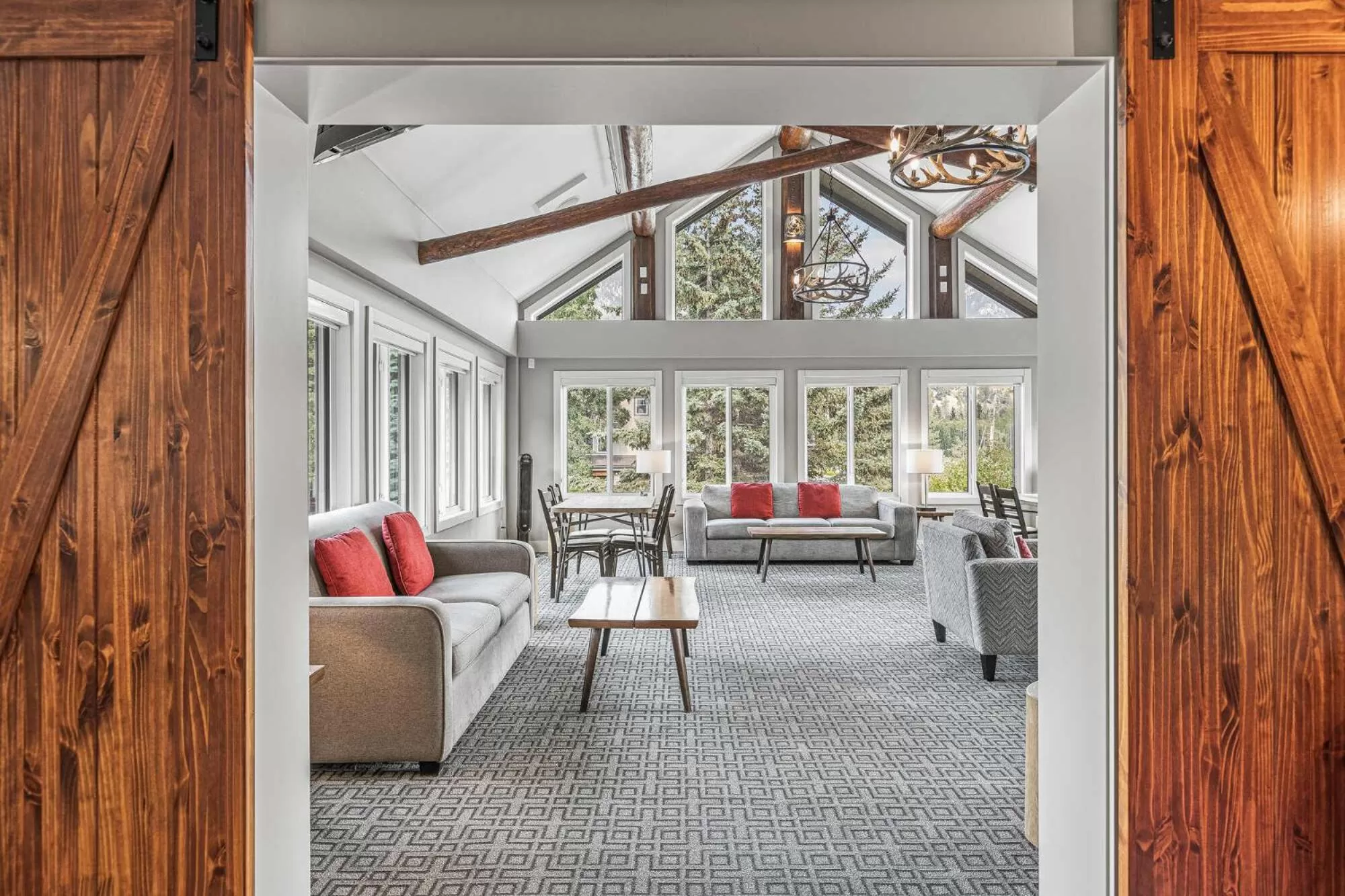 Communal lounge/ TV room in Basecamp Lodge Canmore