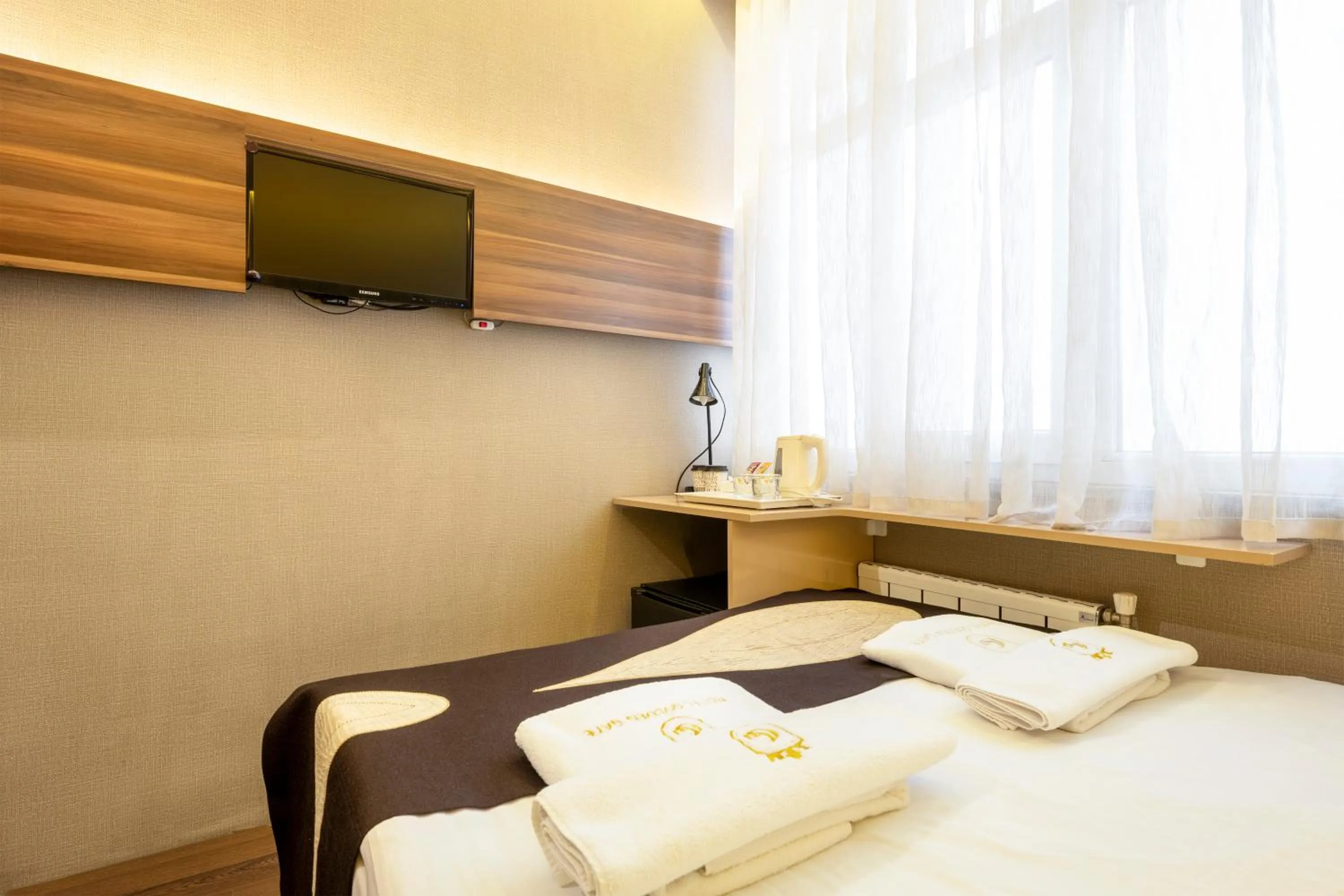 Bed in Golden Gate Hotel Topkapı