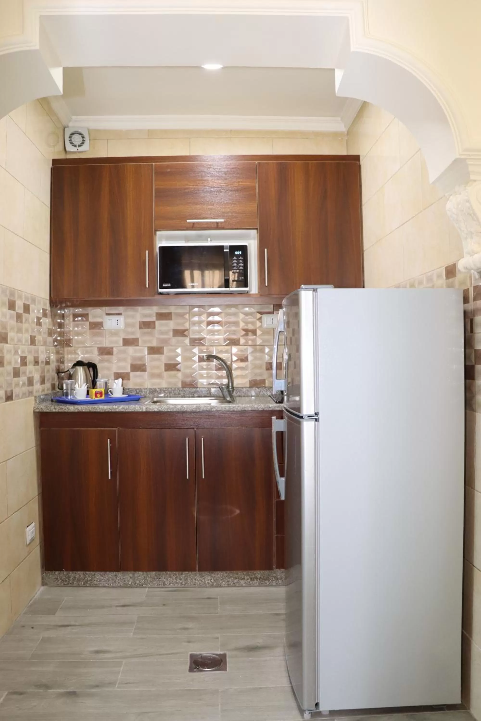 Kitchen or kitchenette in Al Jamal Suites