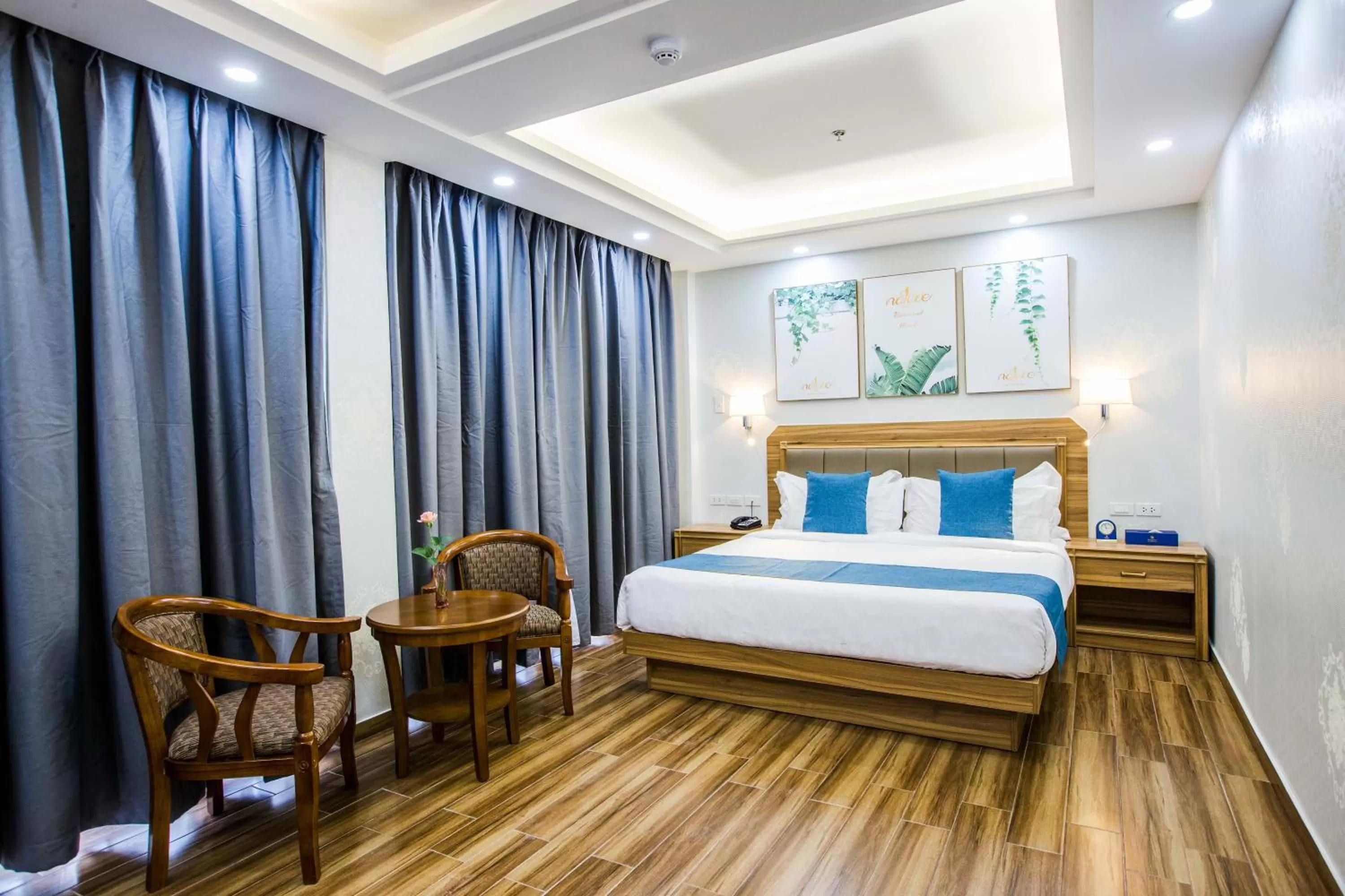 Bed in Costa Palawan Resort