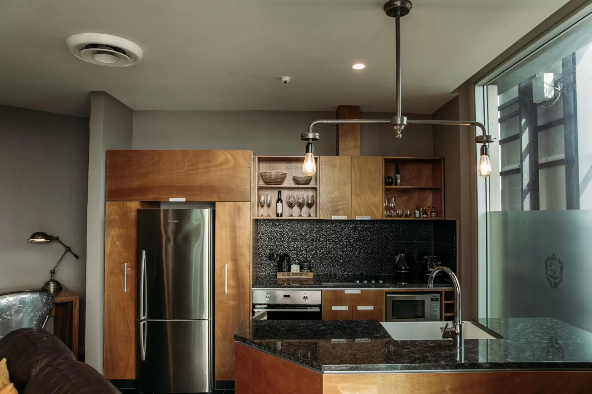 Kitchen or kitchenette in King and Queen Hotel Suites