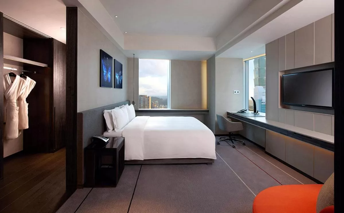 Bed in Humble House Taipei, Curio Collection by Hilton