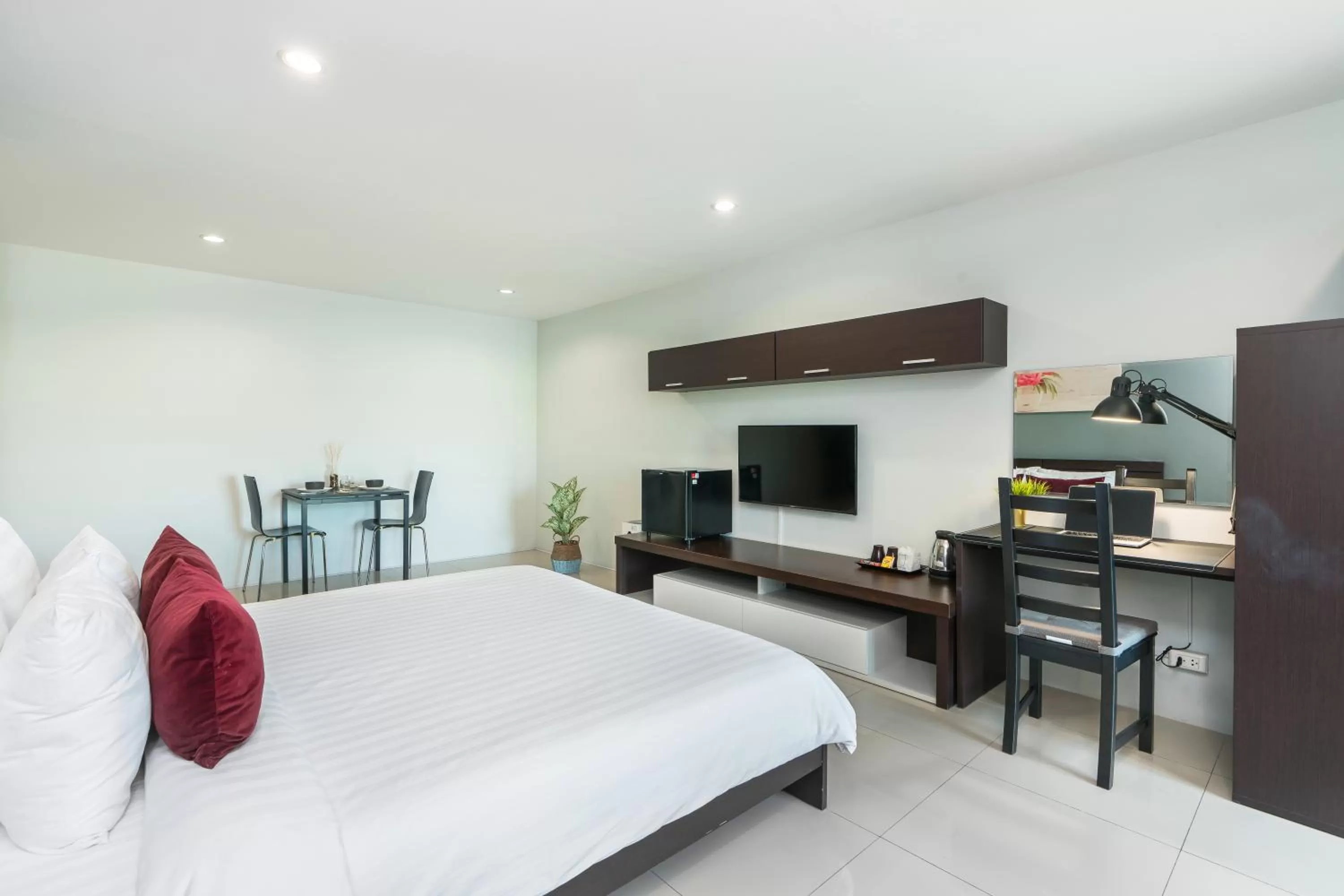 Photo of the whole room, Bed in De Botan Srinakarin Hotel & Residence