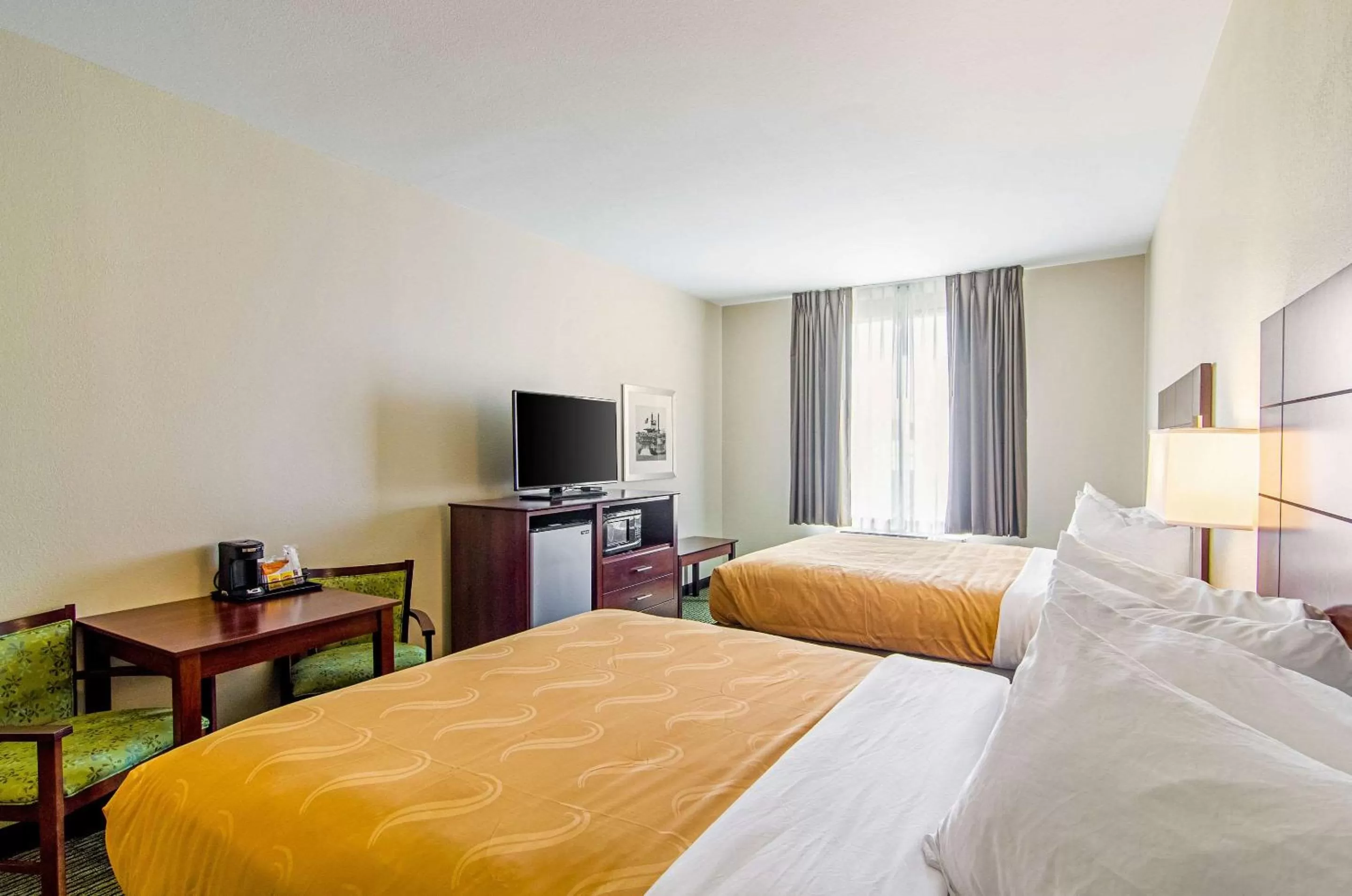 Photo of the whole room, Bed in Quality Inn & Suites Near Tanger Outlet Mall