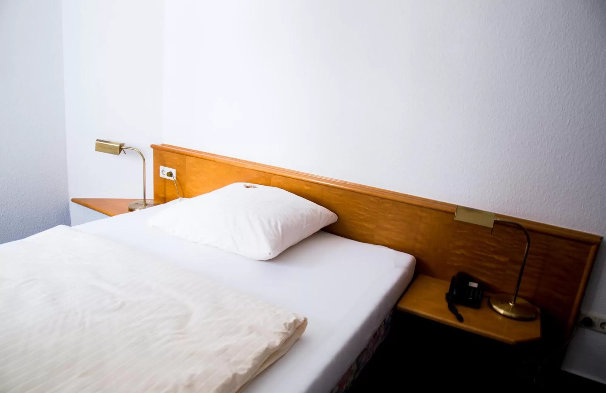 Bed in Hotel am Rathaus