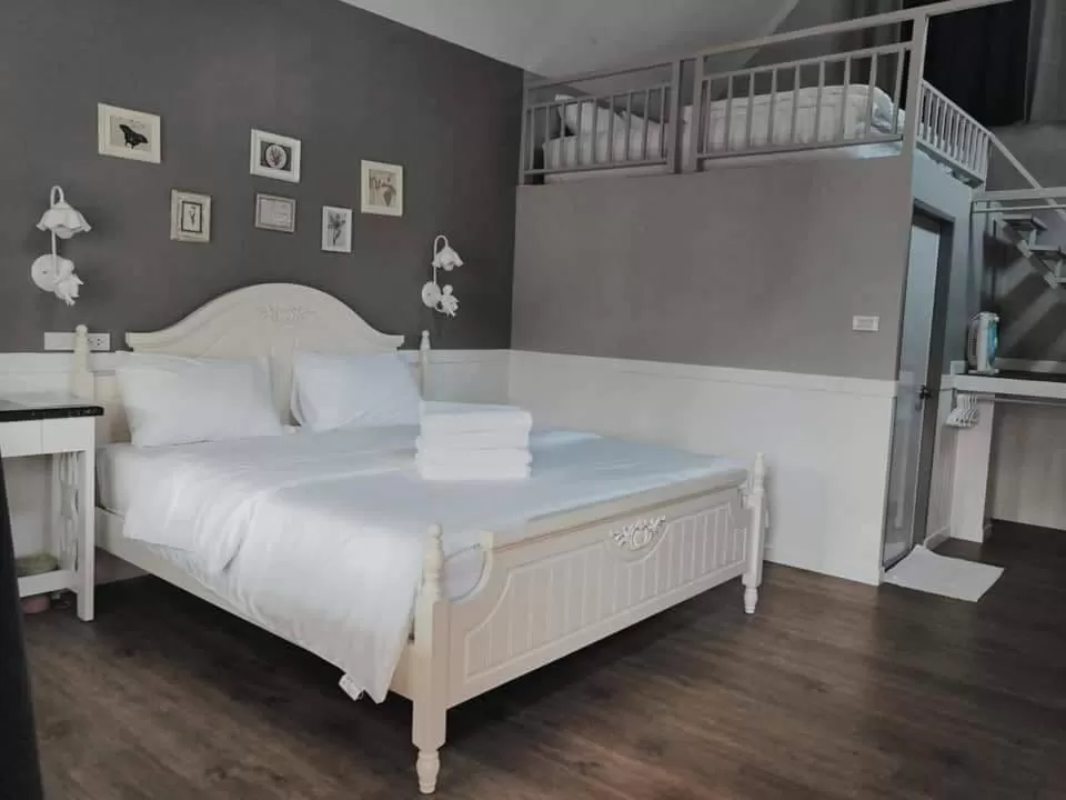 Bed in Baan JaoKorKluay บ้านเจ้ากอกล้วย