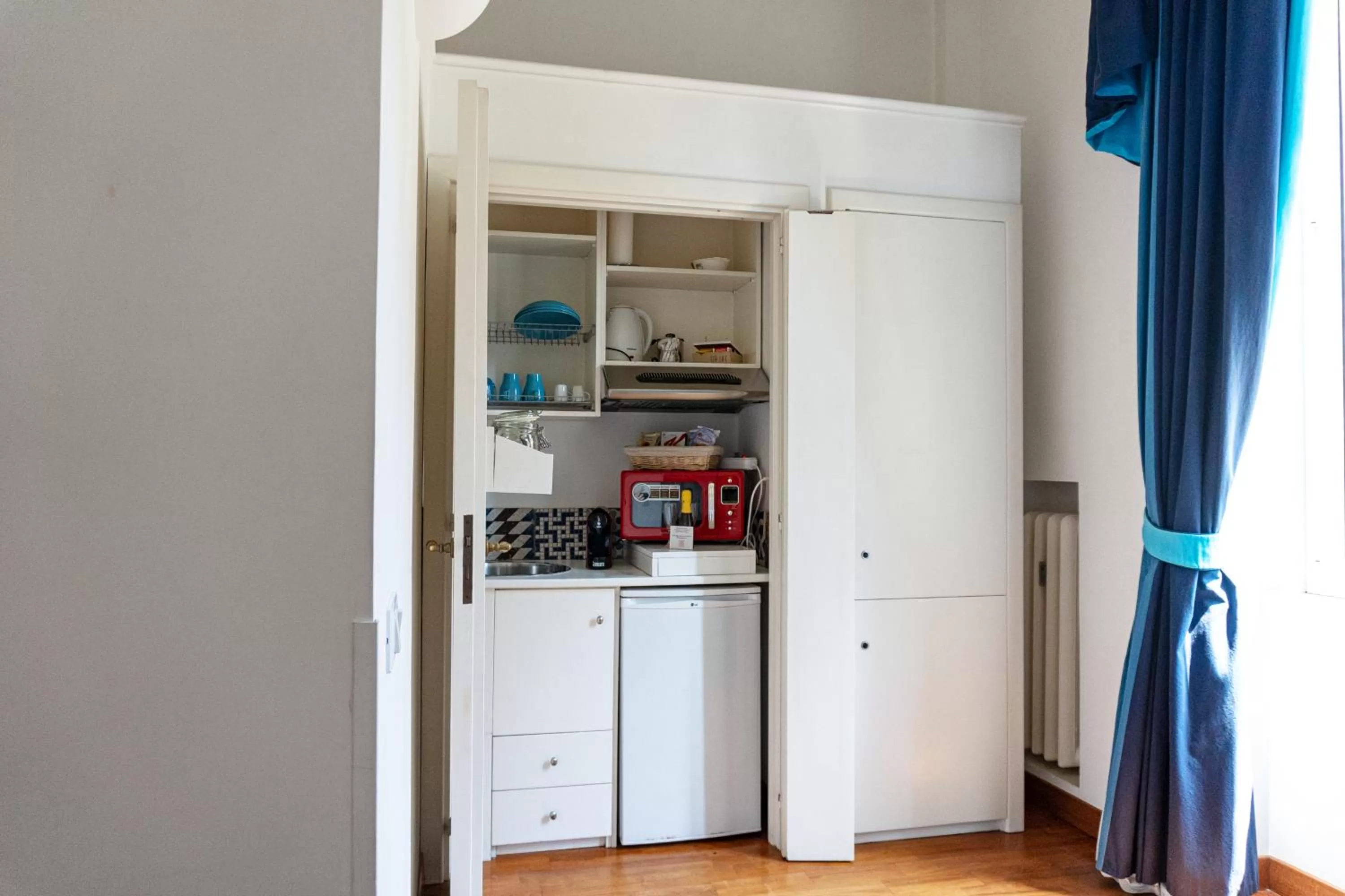 Kitchen or kitchenette in Residenza Romana