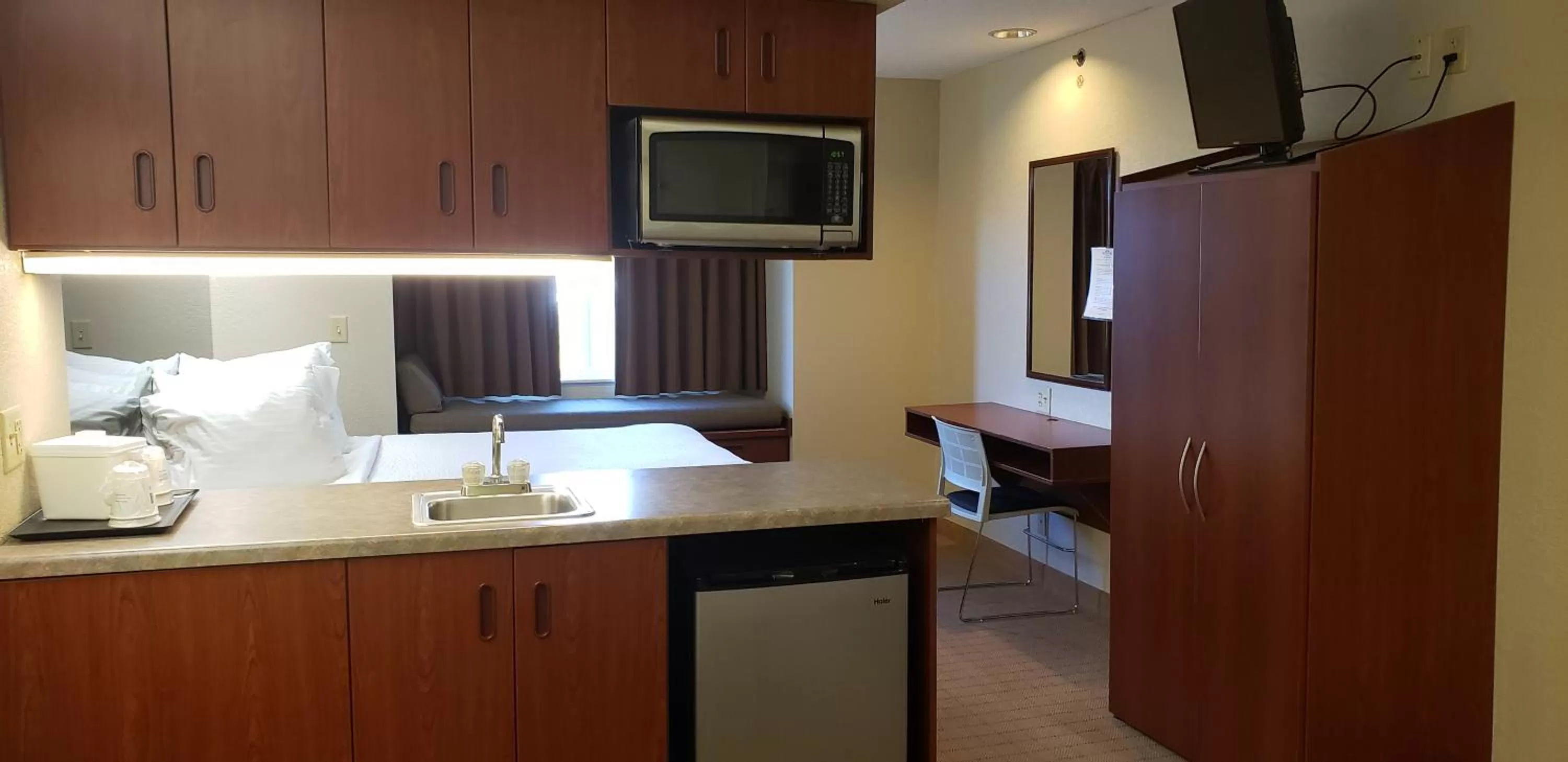 Bed in Microtel Inn & Suites by Wyndham Wellsville