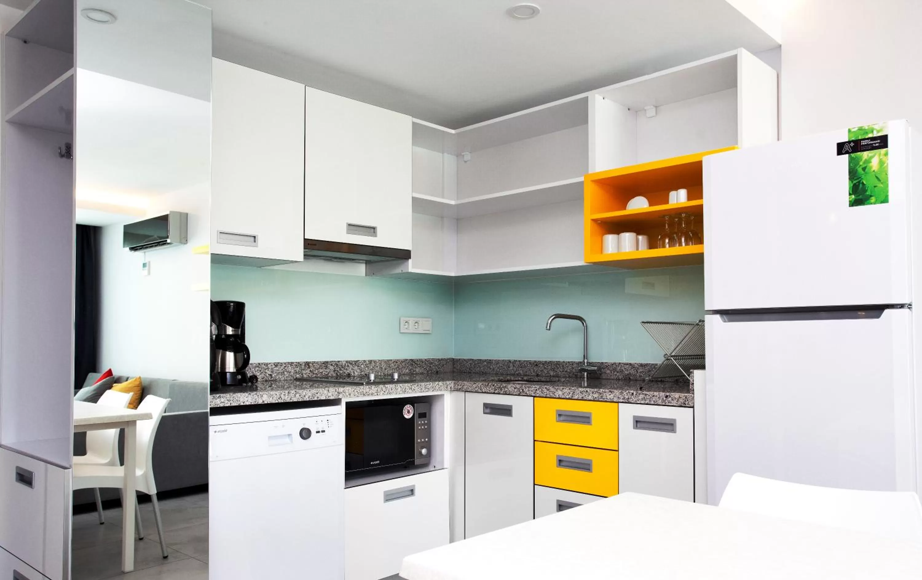 Kitchen or kitchenette in Green Garden Suites Hotel
