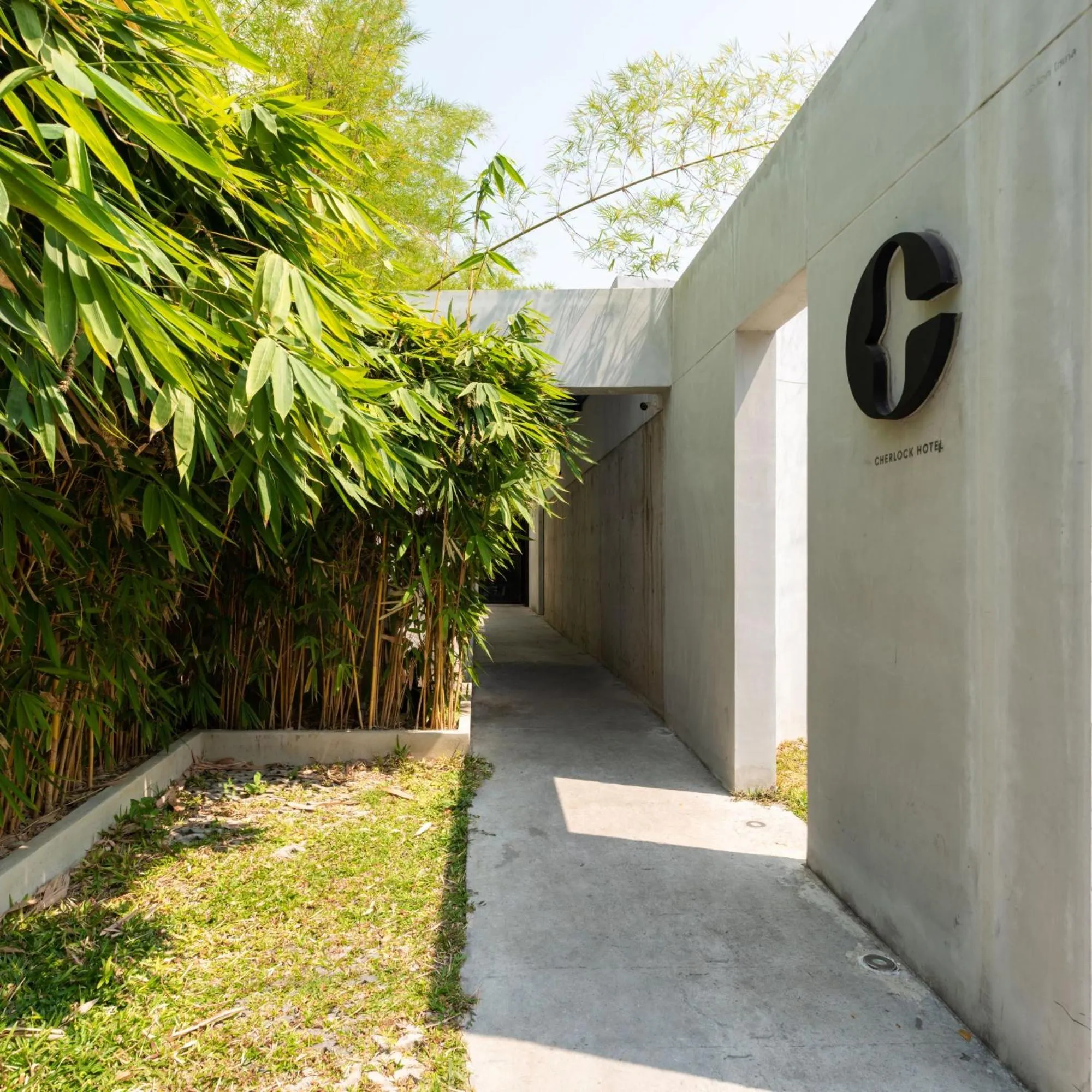 Property logo or sign in Cherlock hotel