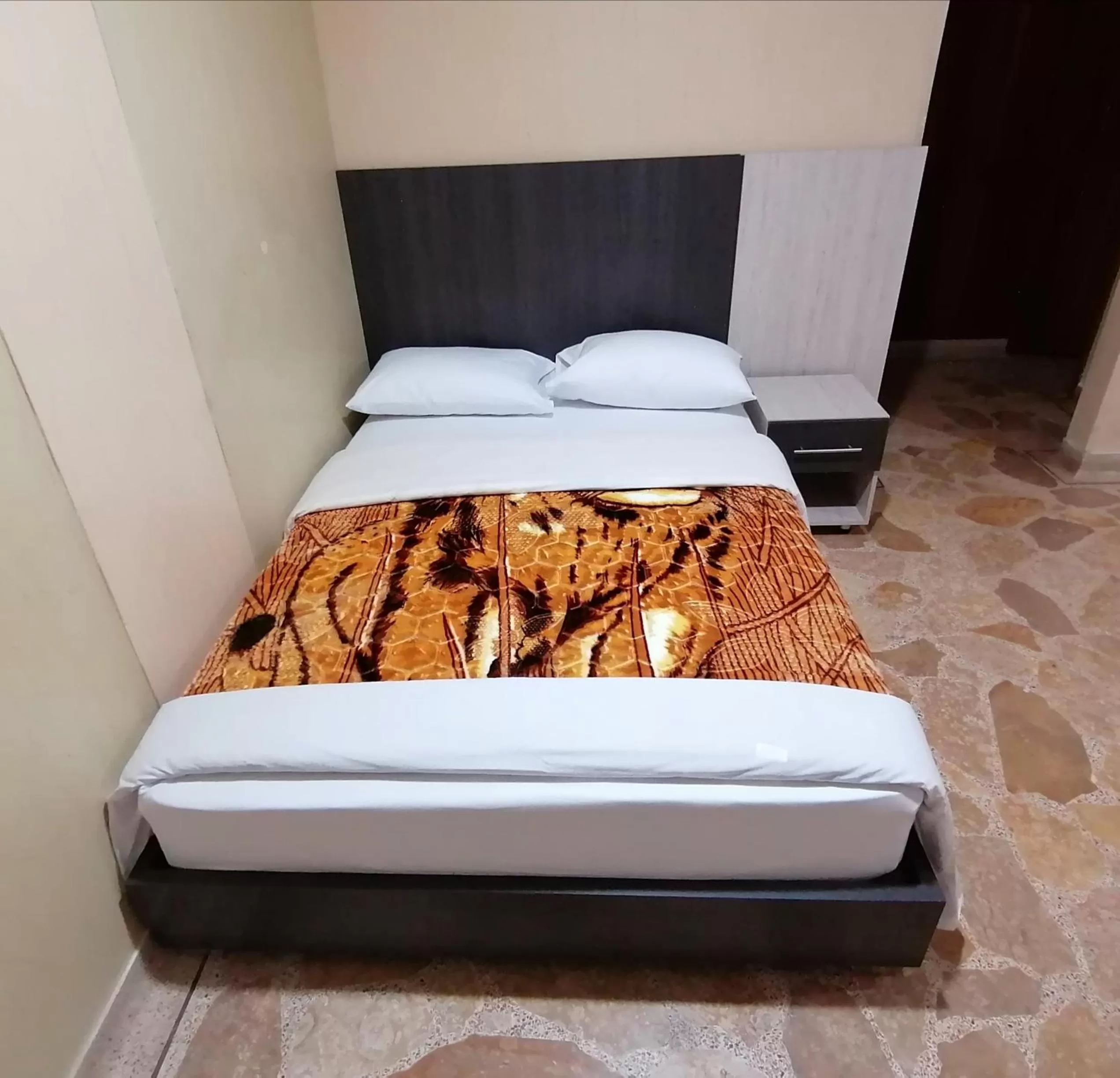 Bed in HOTEL GOLDEN SUITE