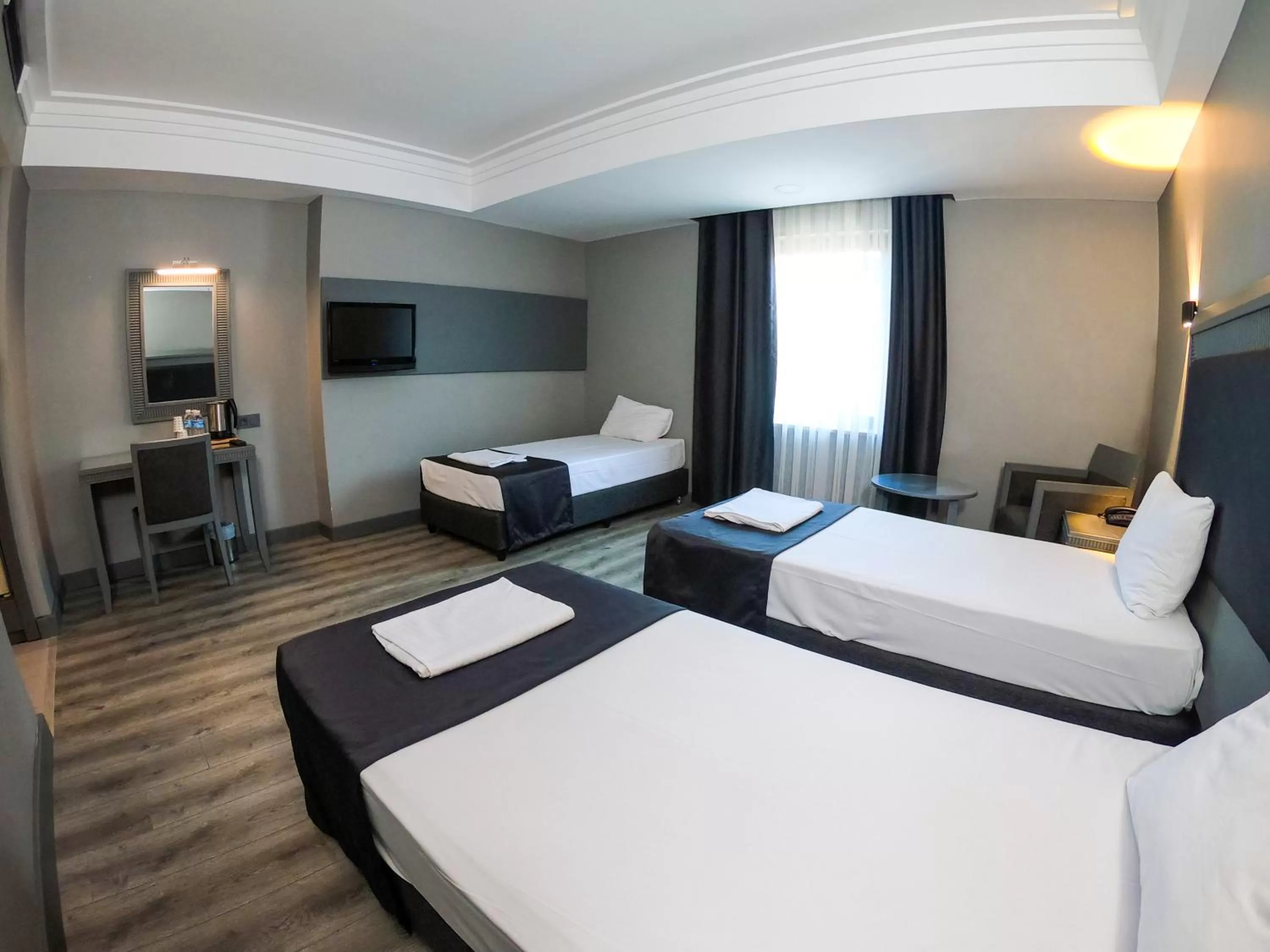 Bed in Grand S Hotel