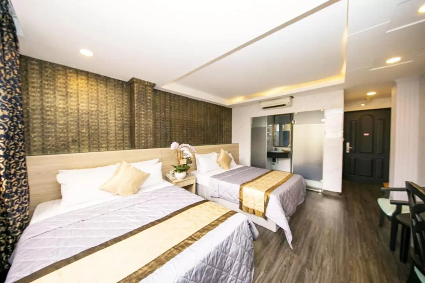 Photo of the whole room, Bed in Nouveau Happy Inn - Bến Thành