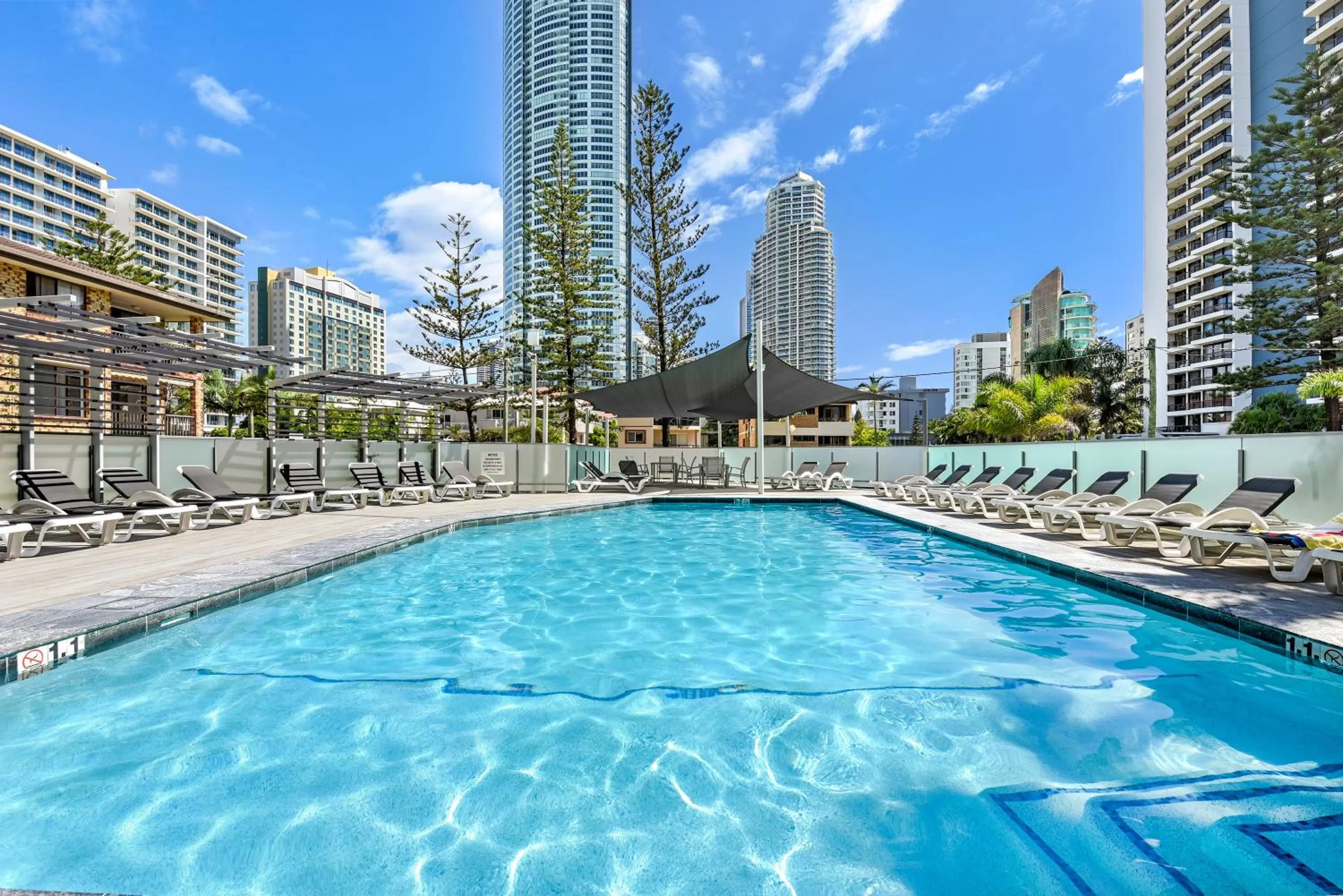 Swimming pool in Surfers Century Oceanside Apartments