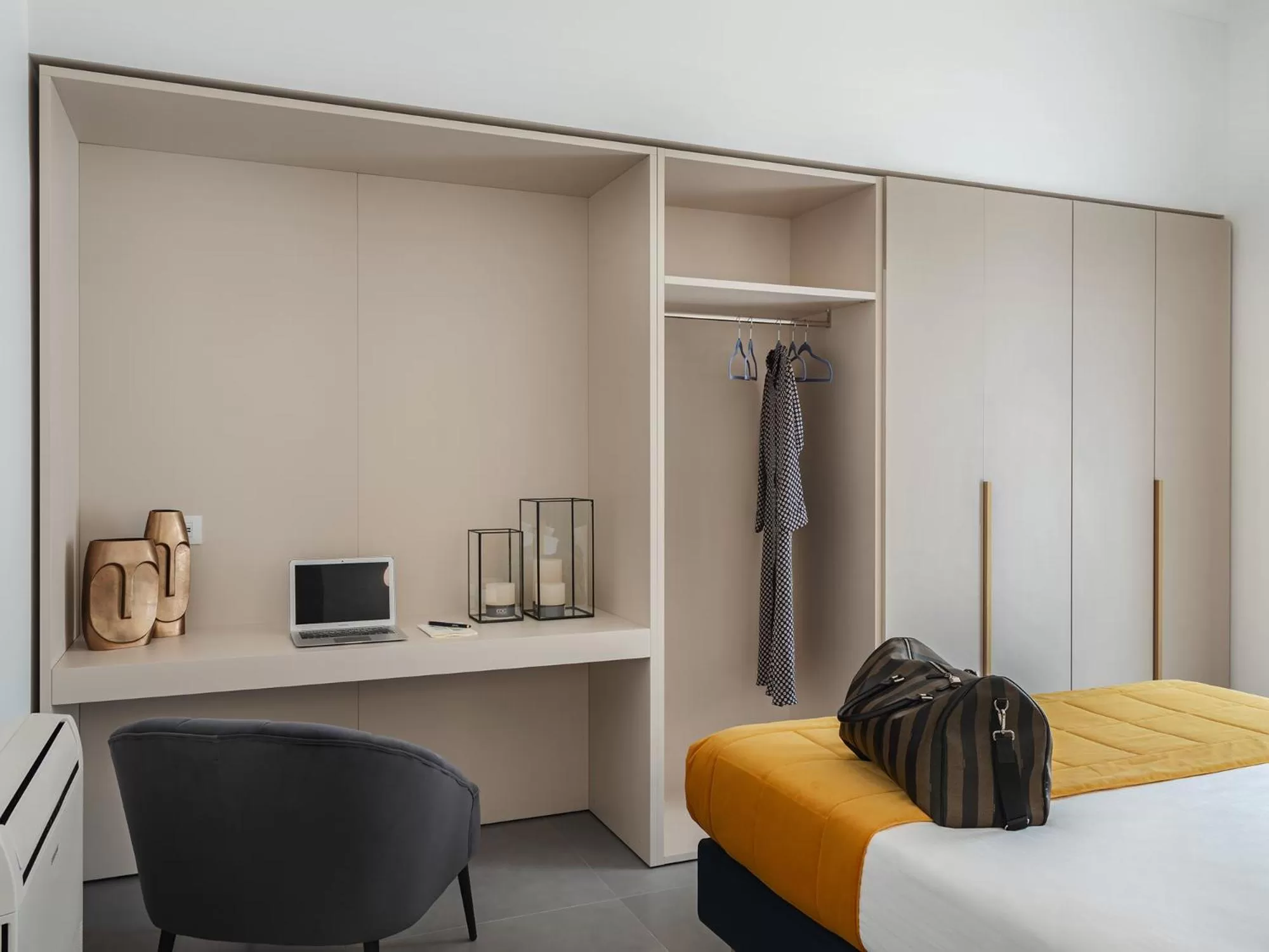 Bed in Living u HomeSuites