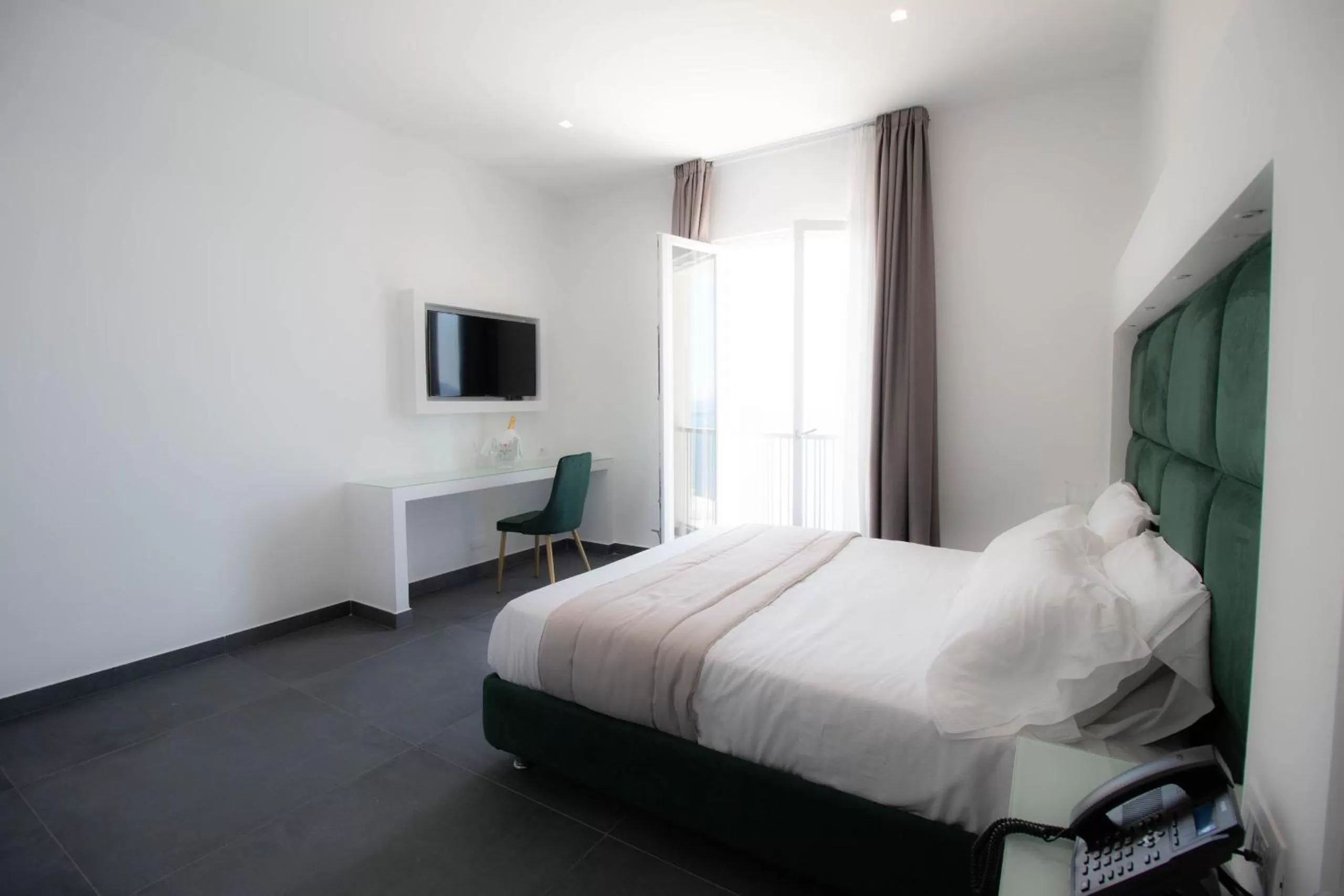 Bed in GRAND HOTEL SERAPIDE