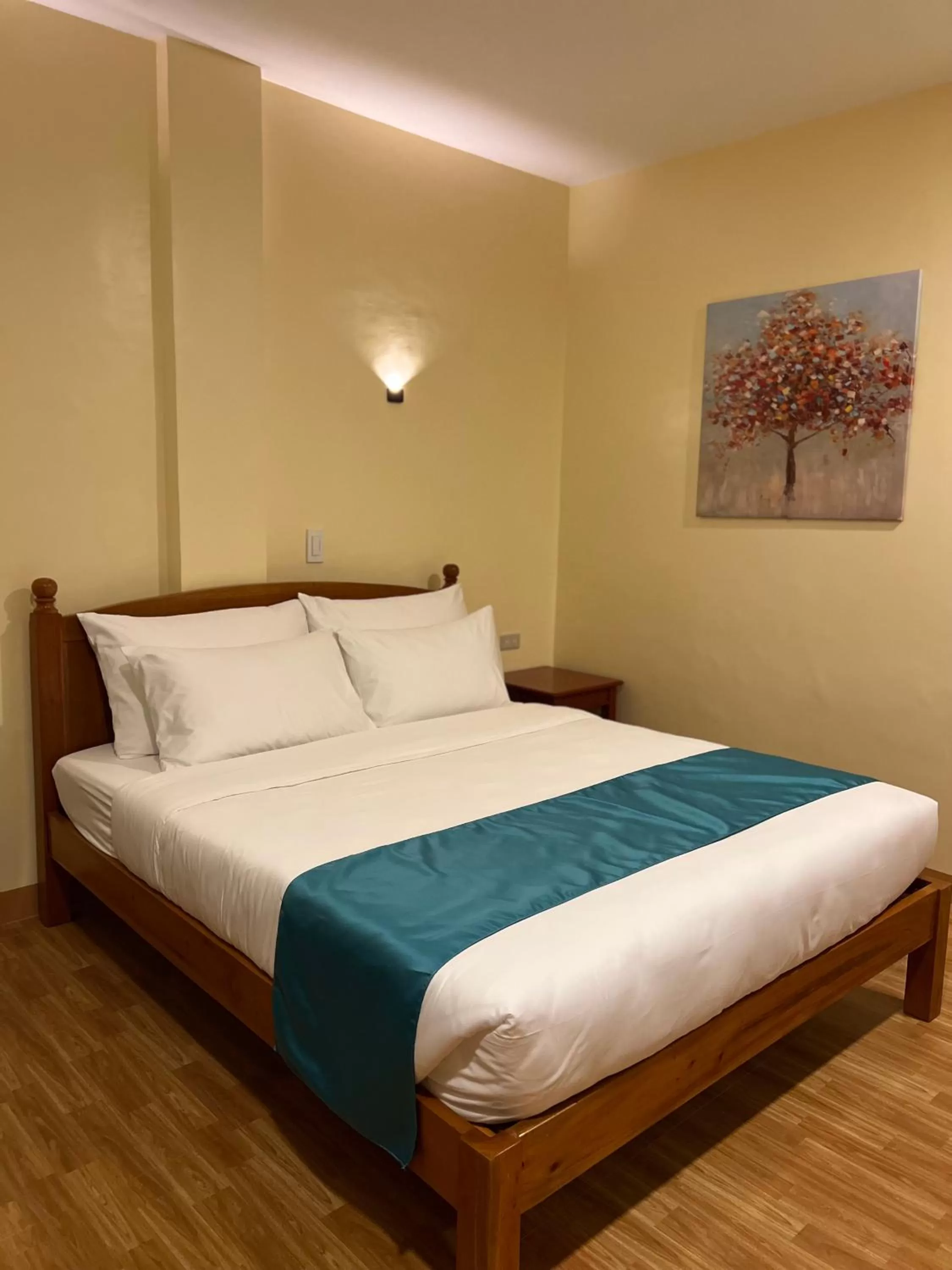 Bed in Rufana Suites