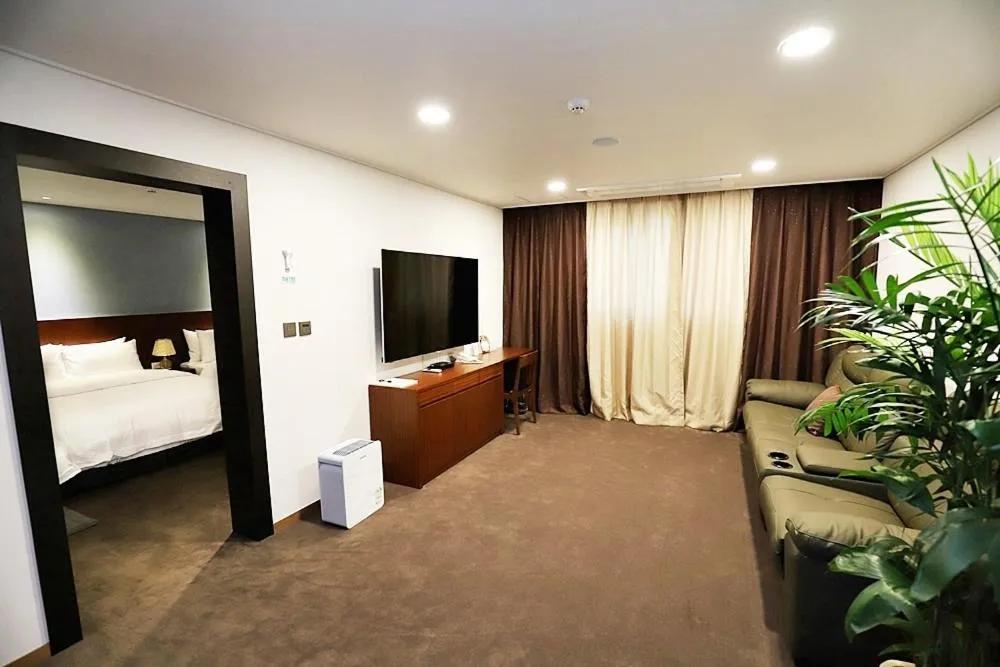 Living room, Bed in Sea Moon Tourist Hotel