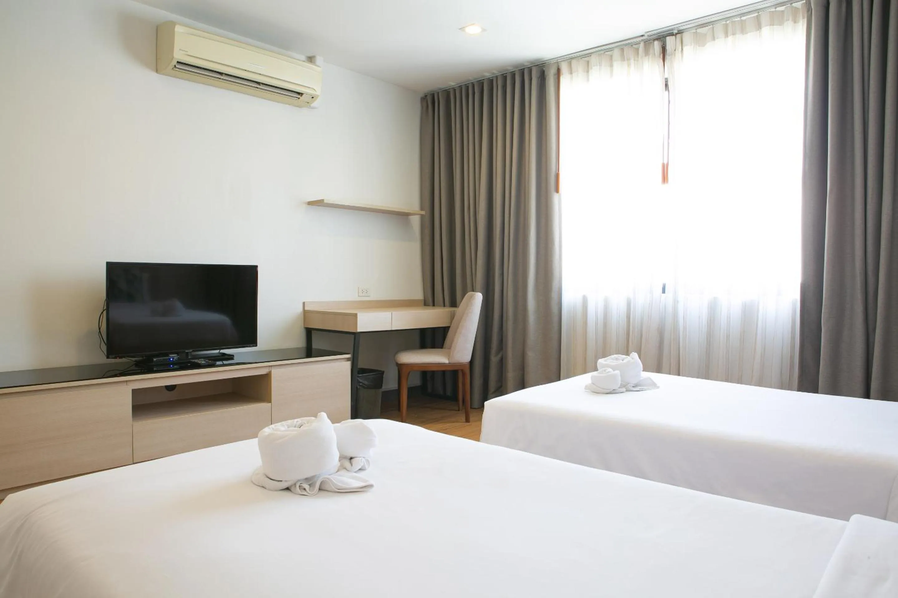 Bed in The Silver Palm Wellness Resort