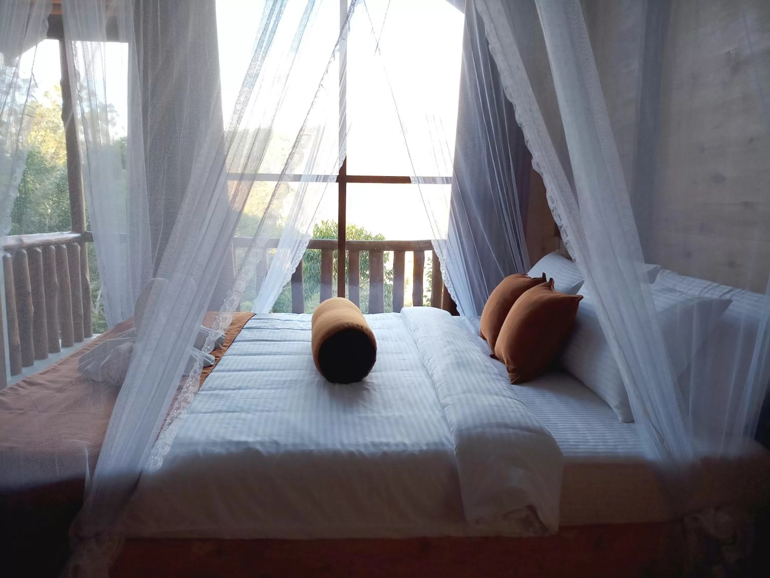 Bed in Saffron Eco Cottage